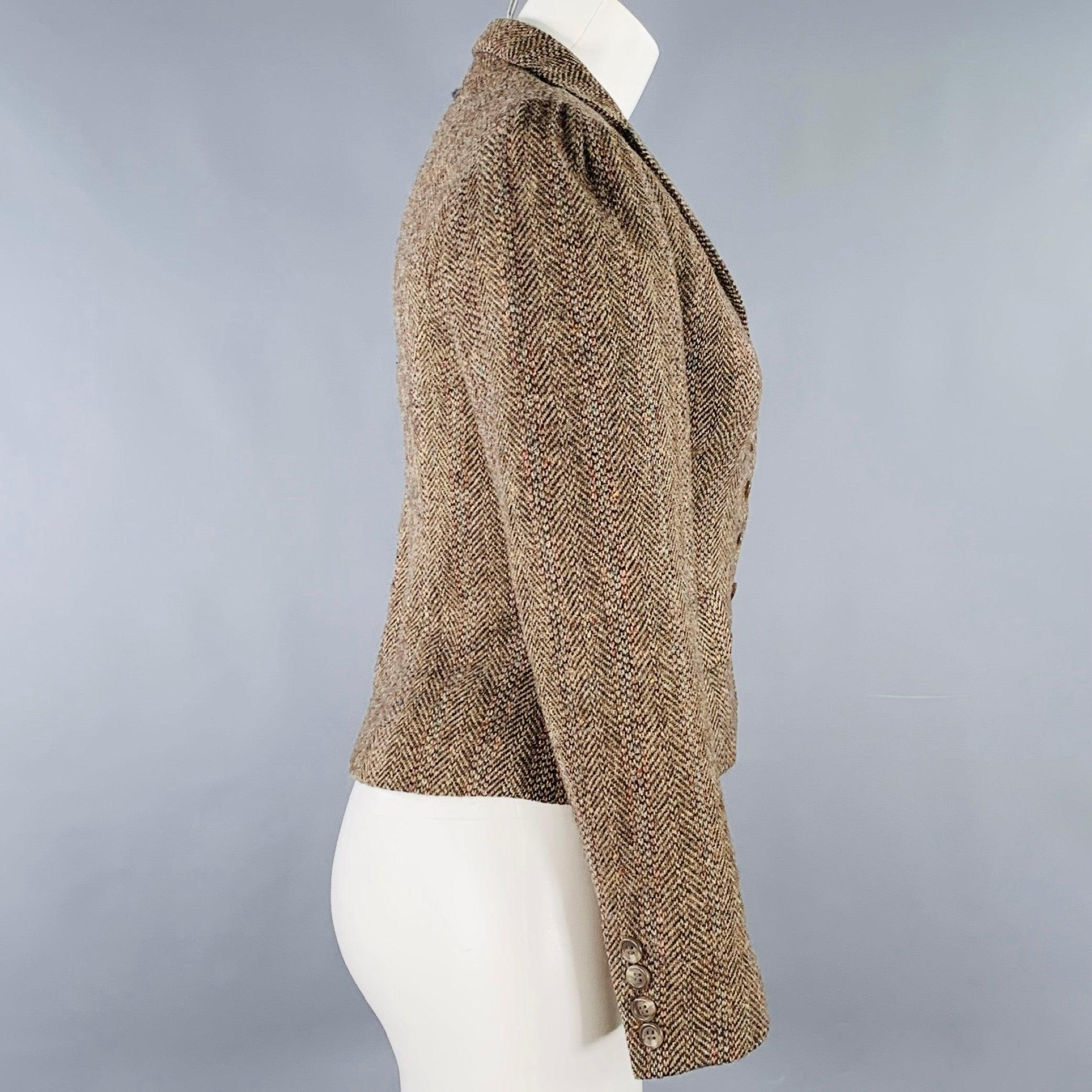 RALPH LAUREN blazer
in a tan and multi-color wool featuring a herringbone pattern, two small pockets, and button closure. Made in USA.Excellent Pre-Owned Condition. 

Marked:   4 

Measurements: 
 
Shoulder: 15 inches Bust: 33 inches Sleeve: 23