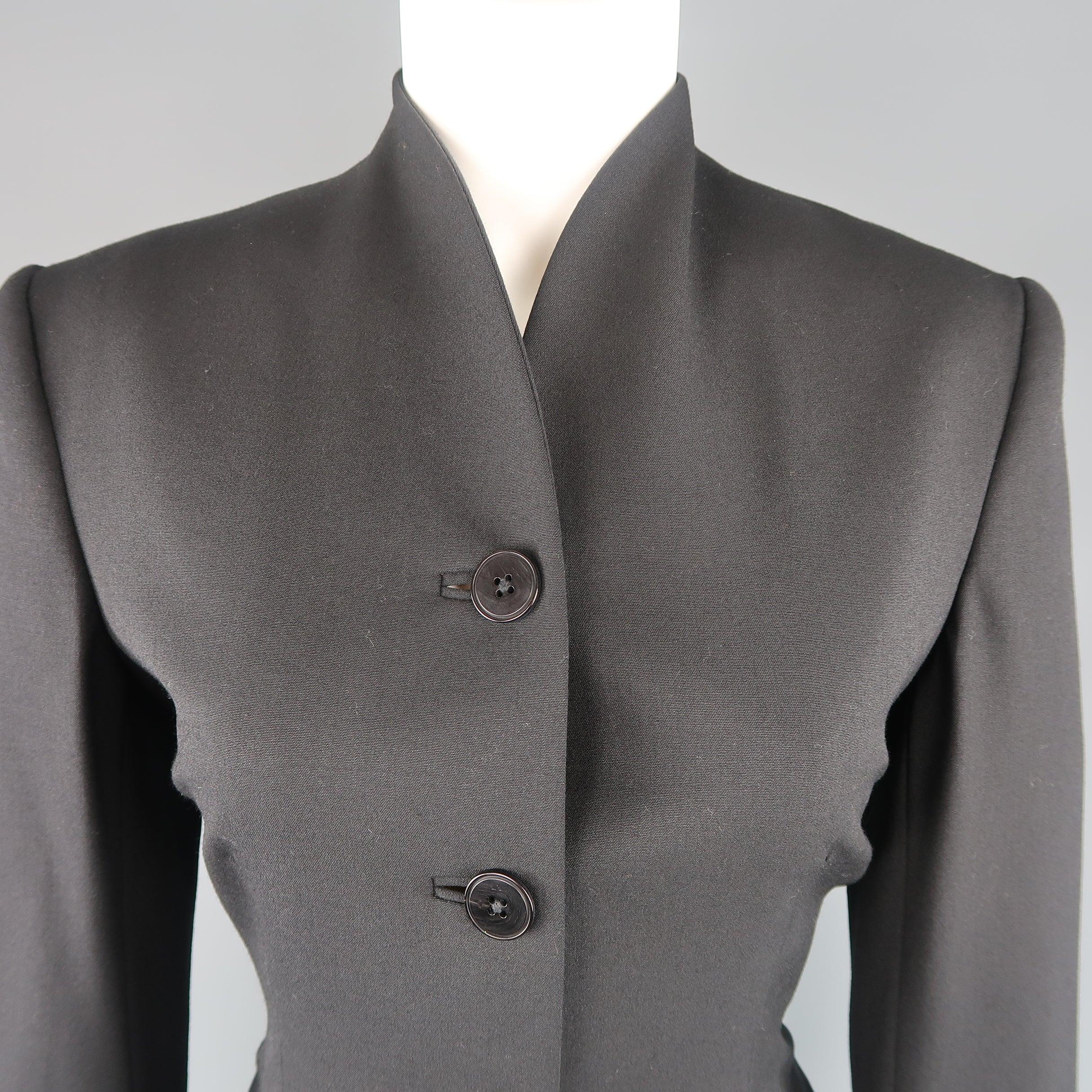 RALPH LAUREN BLACK LABEL jacket comes in black wool with a four button front, cropped,tailored silhouette, and stand up collar. Small imperfection on back. Made in USA.
Good Pre-Owned Condition.
 

Marked:   6
 

Measurements: 
  
l	Shoulder: 16