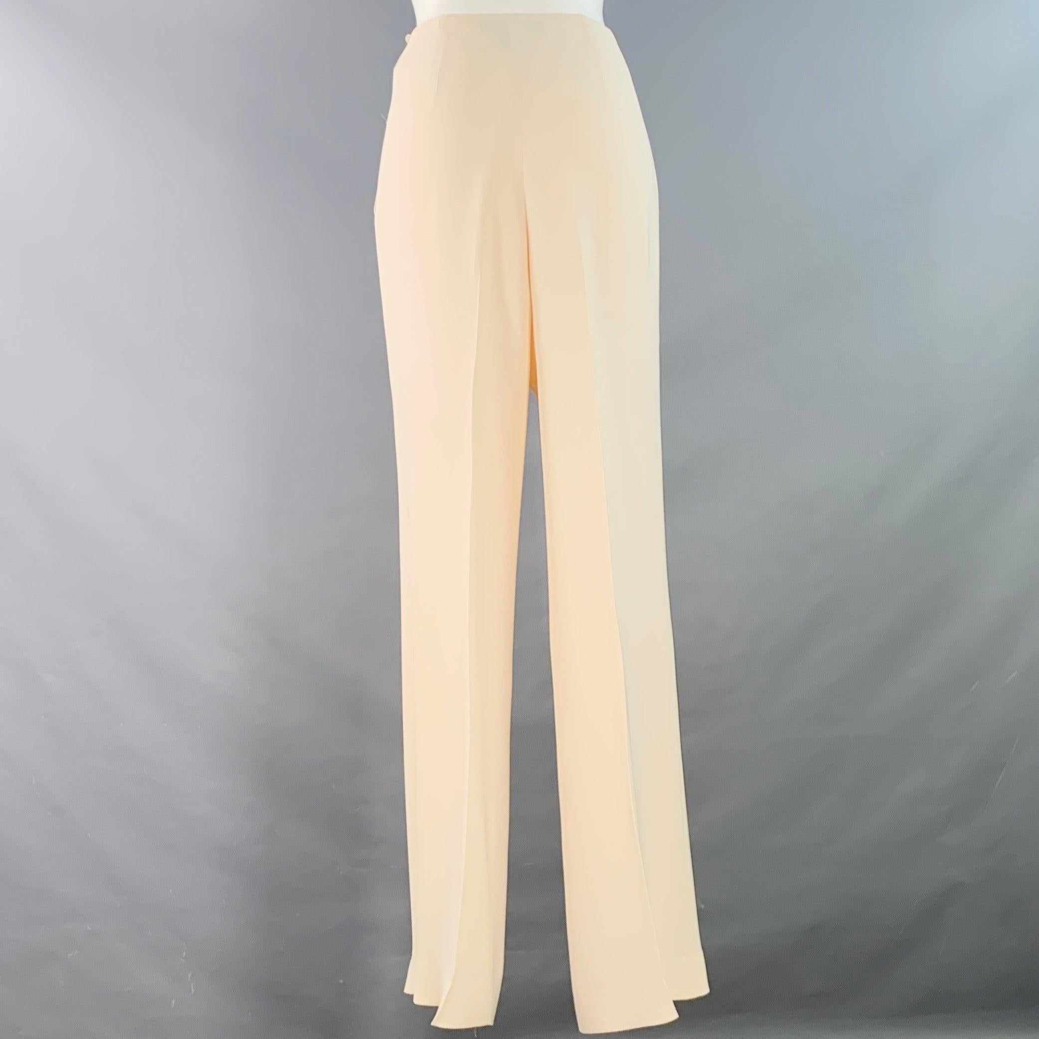 RALPH LAUREN BLACK LABEL dress pants
in a cream silk featuring a wide leg style, and silver tone metal side button closure.Good Pre-Owned Condition. Moderate marks and signs of wear, please check photos. As is. 

Marked:   6 

Measurements: 
 