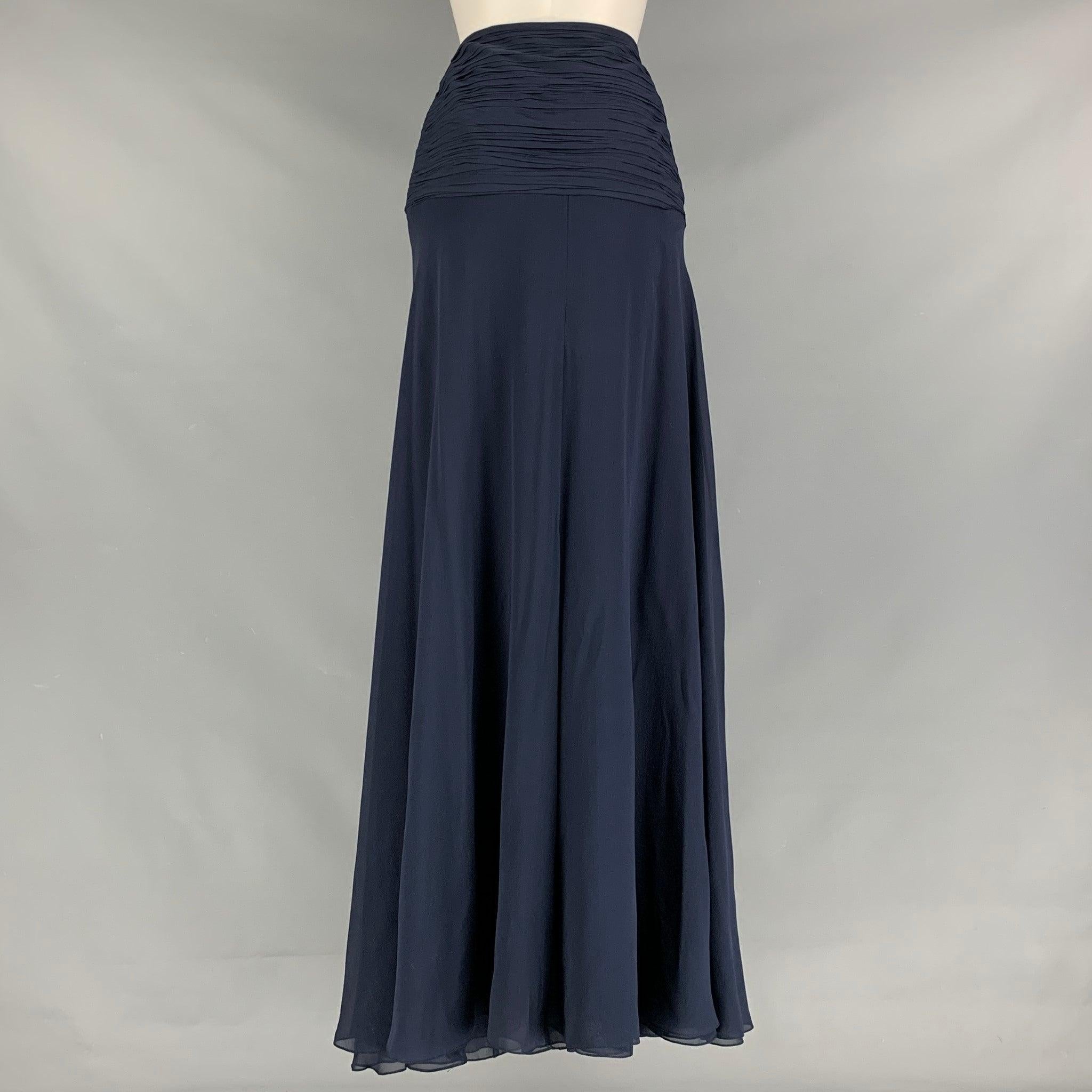 RALPH LAUREN COLLECTION maxi skirt comes in a navy silk featuring a ruched waistband, invisible zipper closure at left side. Made in Italy.Excellent Pre-Owned Condition.  

Marked:   6 

Measurements: 
  Waist: 29 inches Hip: 39 inches Length: 46