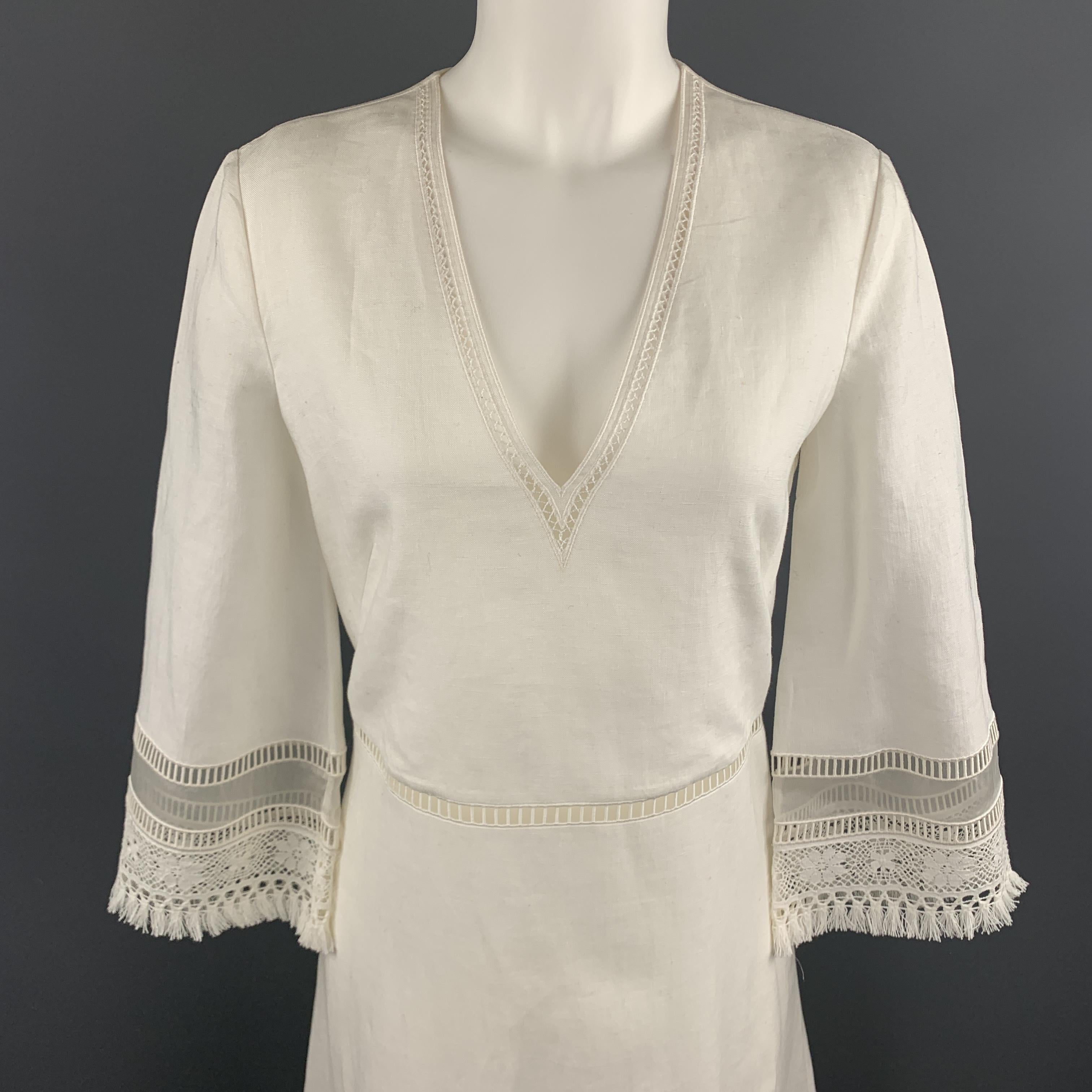 RALPH LAUREN COLLECTION tunic dress comes in white linen with a V neck, A line skirt, and crochet and sheer fringe trims. Made in Italy.

Excellent Pre-Owned Condition.
Marked: US 6

Measurements:

Shoulder: 16.5 in.
Bust: 36 in.
Waist: 31 in.
Hip: