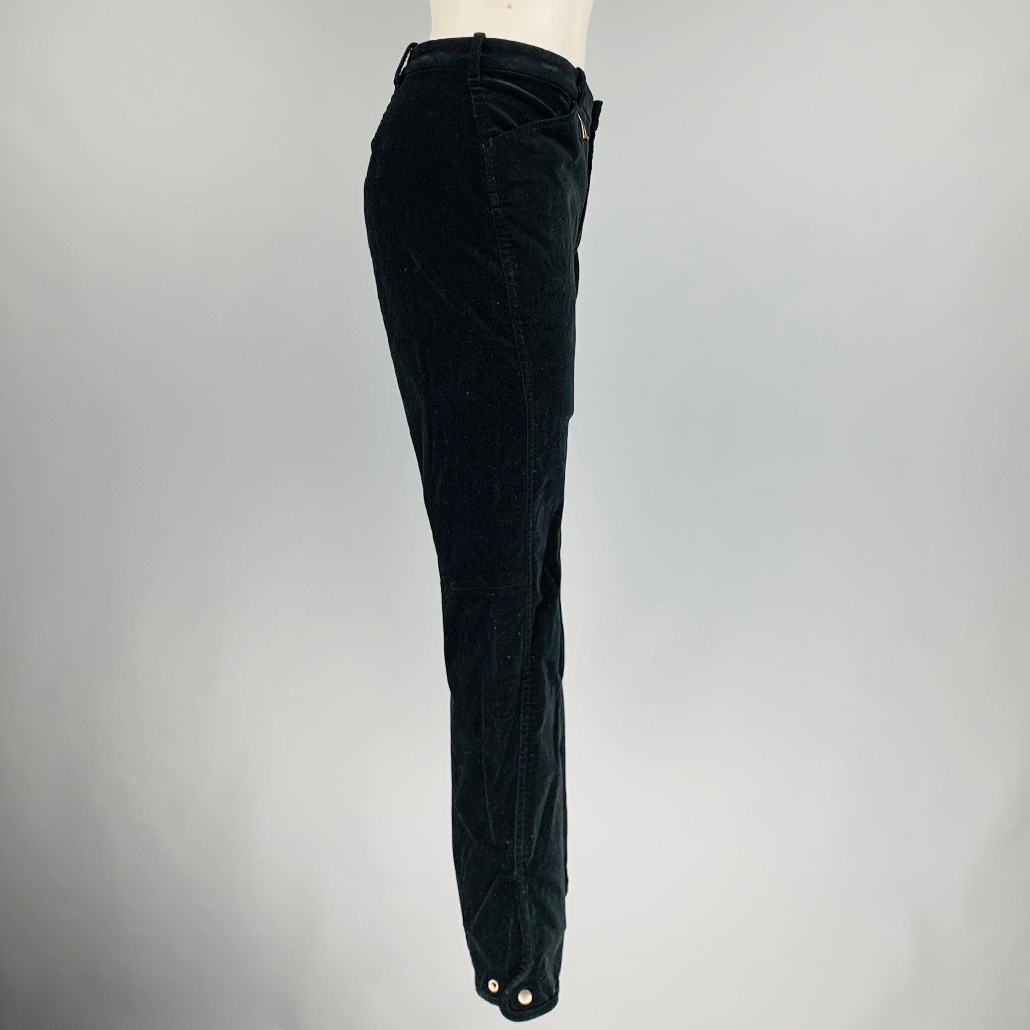 RALPH LAUREN BLUE LABEL casual pants comes in a black velvet cotton and elastane featuring black velvet patch details, slim fit, low rise, and a zip fly closure. Made in USA.Excellent Pre-Owned Condition. 

Marked:   8 

Measurements: 
  Waist: 32