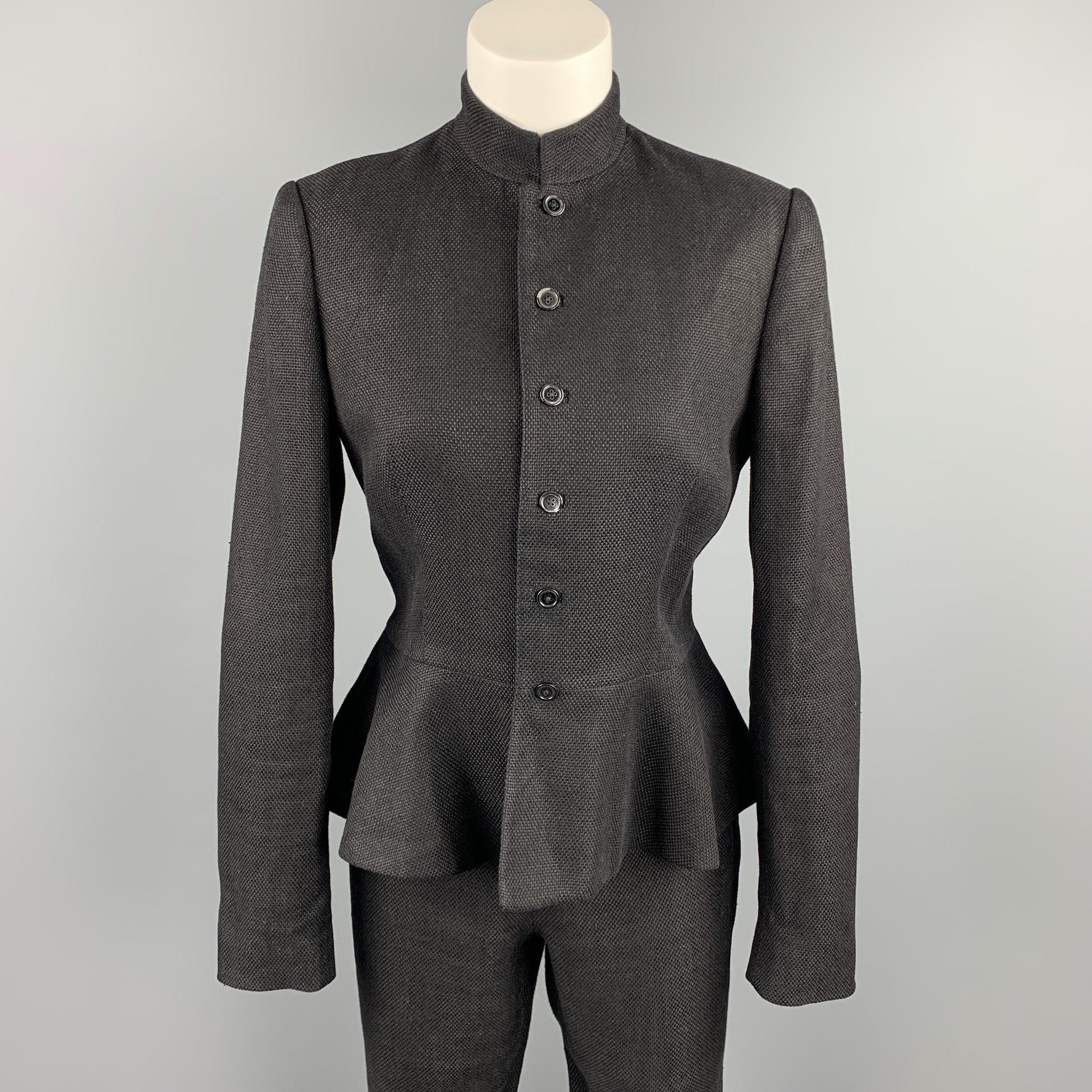 RALPH LAUREN COLLECTION pants set comes in a black woven linen / cotton and includes a peplum style, buttoned closure jacket and matching narrow leg pants.Very Good
Pre-Owned Condition. 

Marked:   8 

Measurements: 
  -JacketShoulder: 15 inches