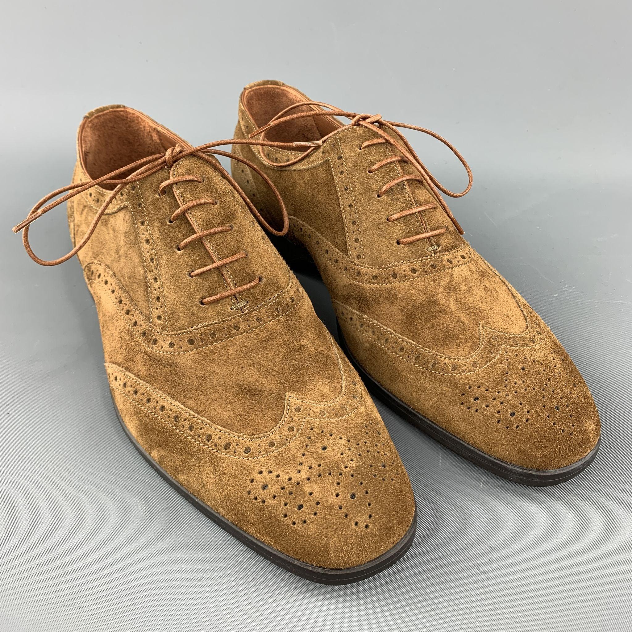 RALPH LAUREN lace up shoes comes in brown perforated suede featuring a wingtip style and a rubber sole. Made in Italy.New With Box. 

Marked:   8 

Measurements: 
  Outsole: 11 inches  x 4 inches 
  
  
 
Reference: 97099
Category: Lace Up