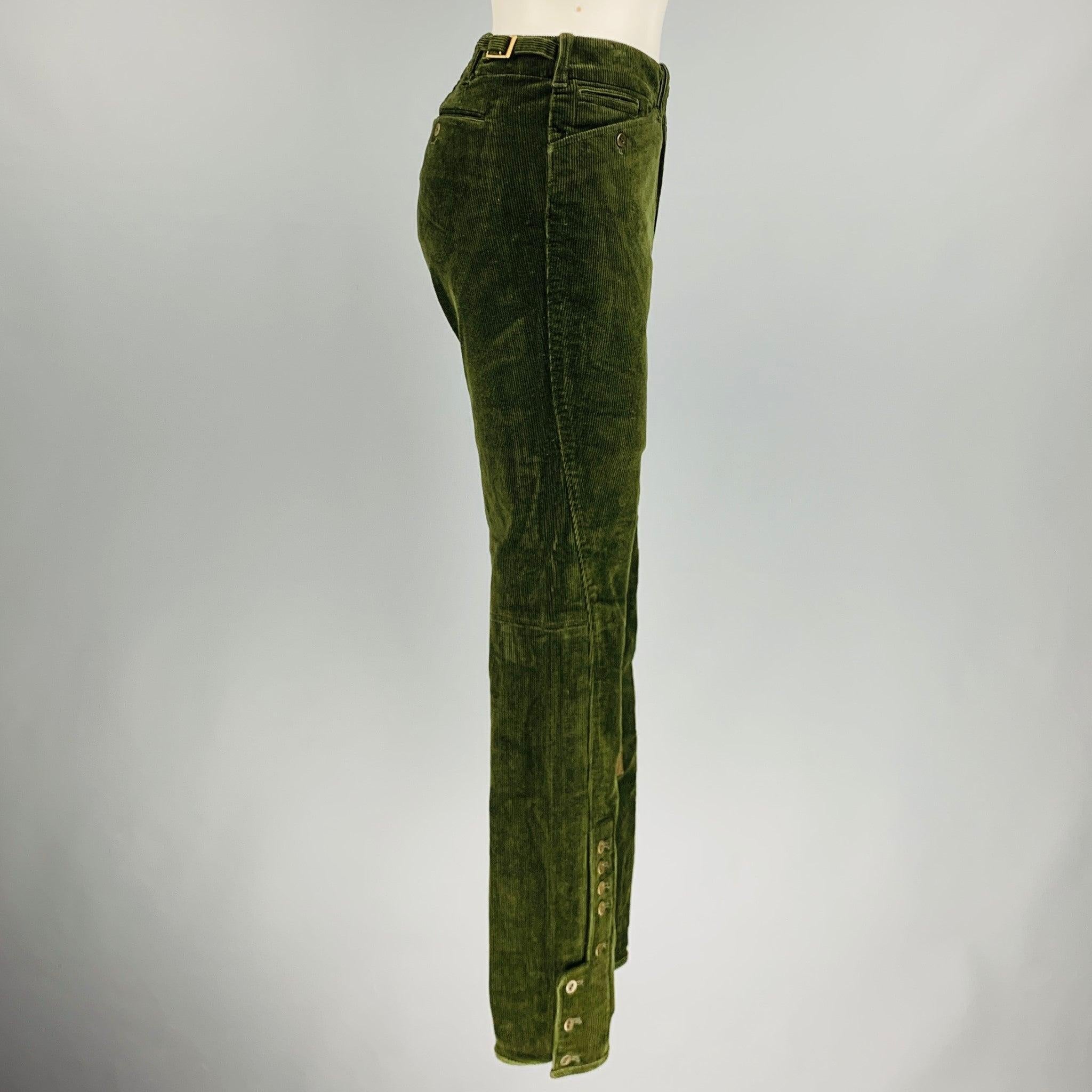 RALPH LAUREN BLUE LABEL casual pants comes in a green olive cotton and elastane corduroy featuring a brown suede patch details, tab detail at waistband, regular fit, low rise, button details at bottom hem, and a zip fly closure.Excellent Pre-Owned