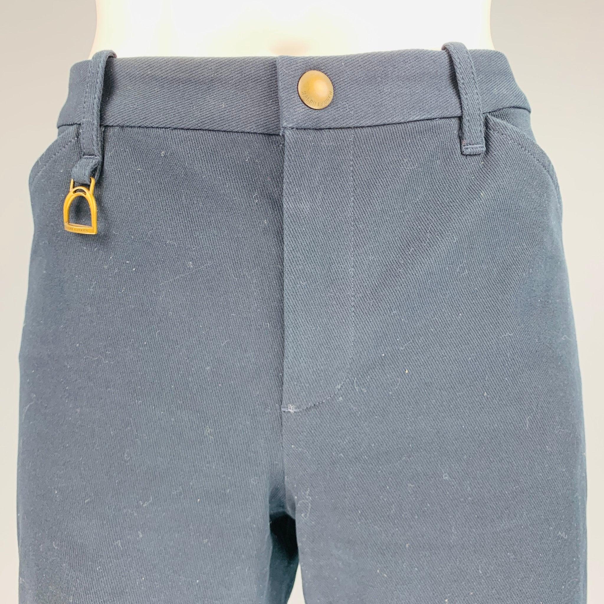 RALPH LAUREN BLUE LABEL casual pants comes in a navy cotton and elastane twill featuring a navy suede patch details, slim fit, low rise, and a zip fly closure. Made in USA.Excellent Pre-Owned Condition. 

Marked:   8 

Measurements: 
  Waist: 32