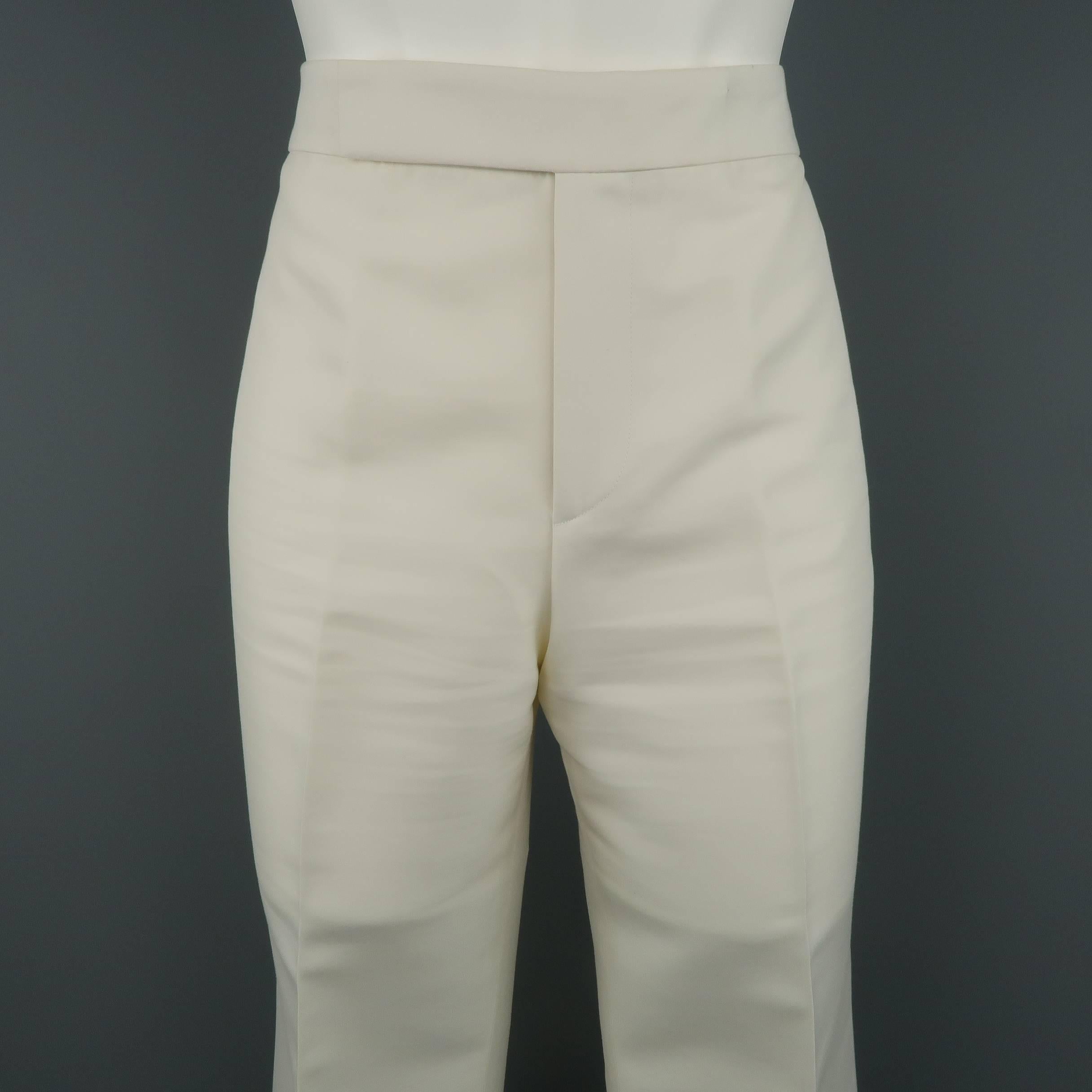 RALPH LAUREN COLLECTION dress pants come in off white cotton silk blend fabric with a hidden closure and flaired bell bottom silhouette. Matching jacket available separately. Imperfections on waistband. As-is. Made in Italy.
 
Good Pre-Owned