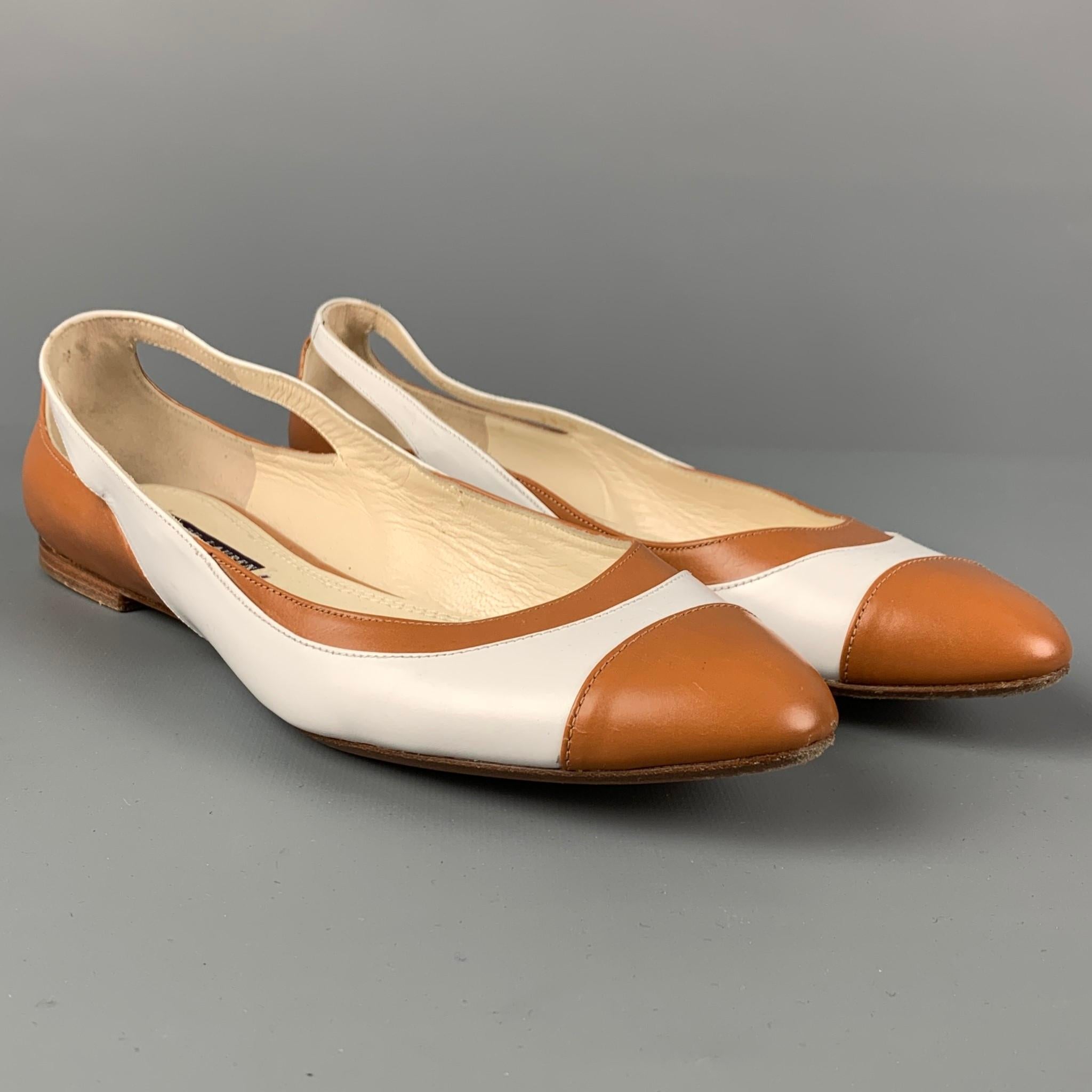 RALPH LAUREN COLLECTION flats comes in a tan & white leather featuring a cut-out design and a slip on style. Made in Spain. 

Very Good Pre-Owned Condition.
Marked: 38

Outsole: 10.25 in. x 3 in. 