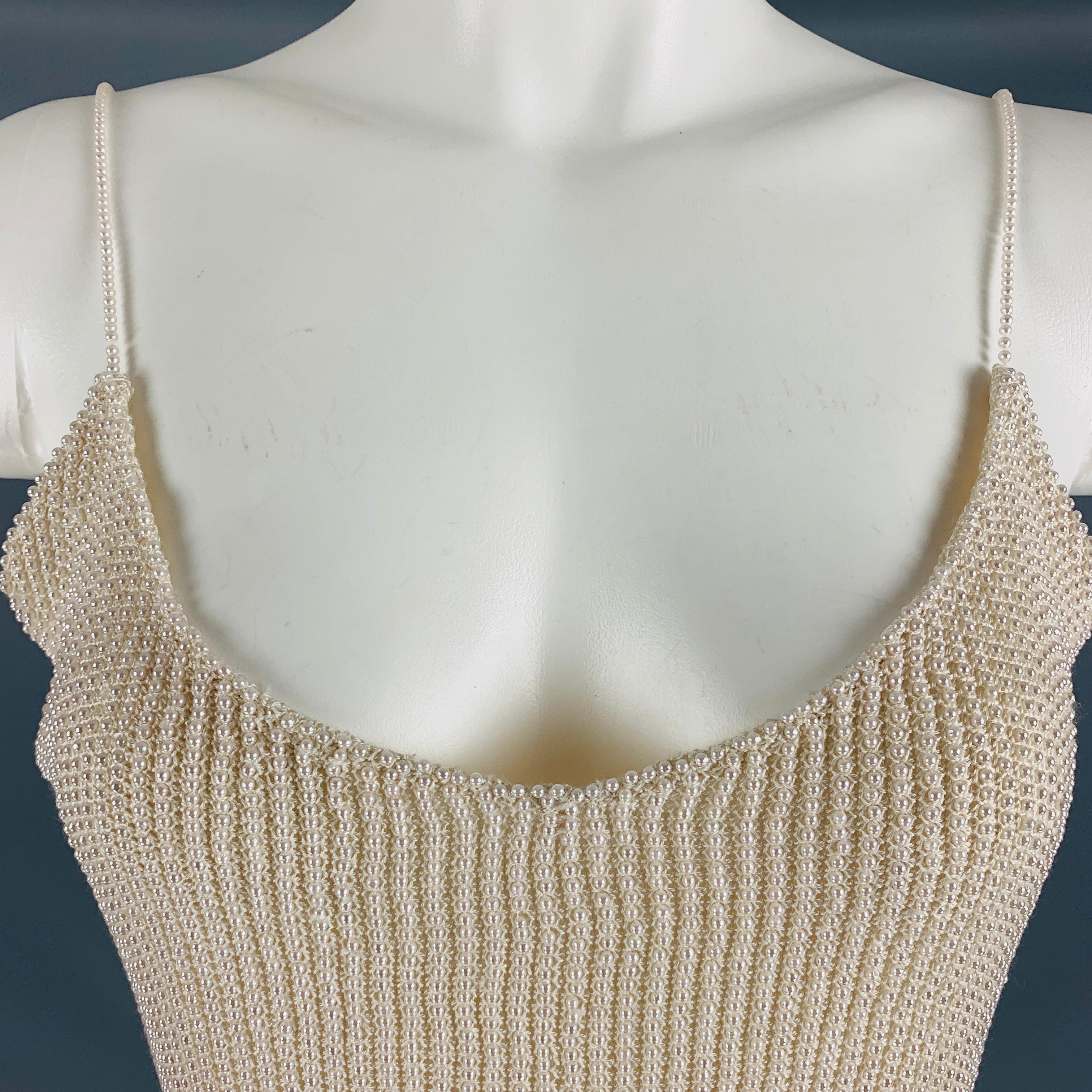 RALPH LAUREN COLLECTION by tank top comes in a beige viscose knit featuring a faux pearl beaded texture and faux pearl spaghetti straps. Excellent Pre-Owned Condition. 

Marked:   L 

Measurements: 
  Bust: 34 inches  Length: 13 inches  
  
  
