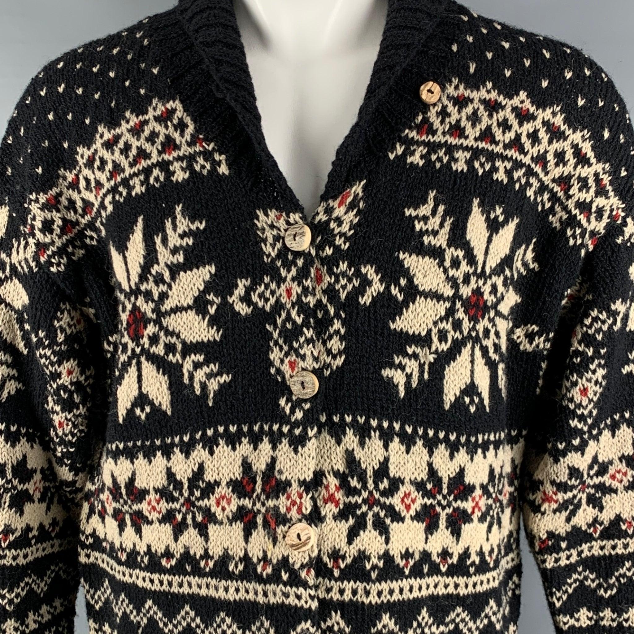 RALPH LAUREN cardigan in a black wool silk blend fabric featuring a white and red Nordic-style snowflake pattern, oversized fit, shawl collar, and button closure.Very Good Pre-Owned Condition. Minor signs of wear. 

Marked:   L 

Measurements: 
