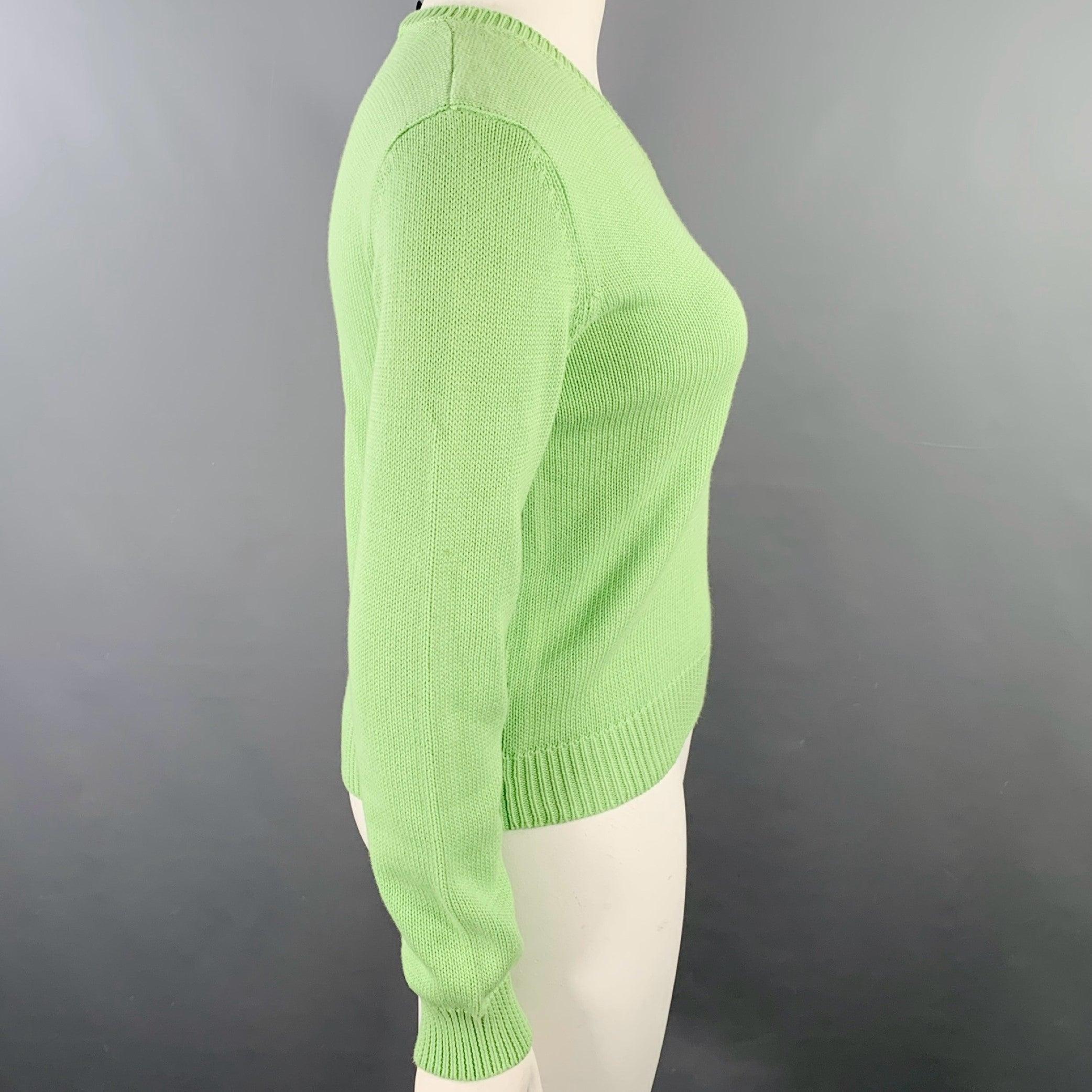 RALPH LAUREN GOLF sweater
in green cotton knit featuring long sleeves and V-neck.Excellent Pre-Owned Condition. 

Marked:   L 

Measurements: 
 
Shoulder: 17 inches Bust: 36 inches Sleeve: 25 inches Length: 21 inches 
  
  
 
Sui Generis Reference:
