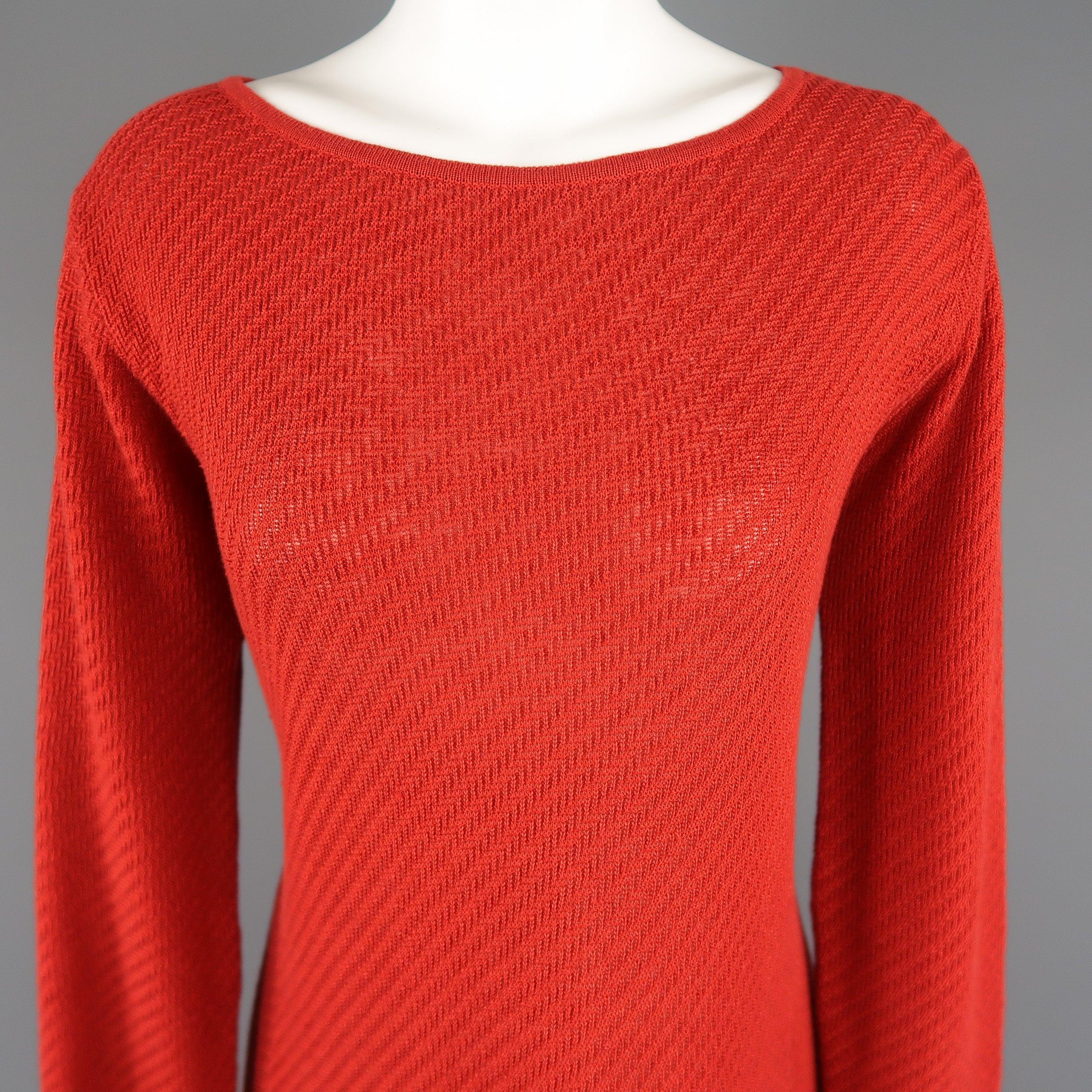RALPH LAUREN COLLECTION pullover sweater tunic comes in red linen knit with a boat neck, long sleeves, and double slit hem. 
Excellent Pre-Owned Condition.
 

Marked:   L
 

Measurements: 
  
l	Shoulder: 16 inches 
l	Bust: 40 inches 
l	Sleeve: 21