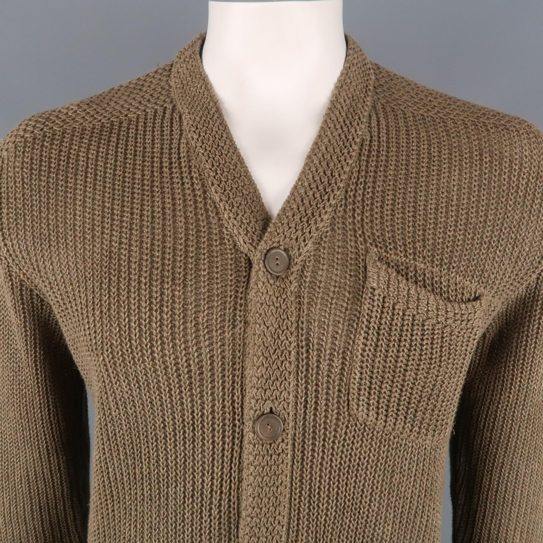RALPH LAUREN cardigan comes in a tan ribbed knit camel hair blend featuring a high collar style, buttoned closure, and patch pockets.
 
Excellent Pre-Owned Condition.
Marked: L
 
Measurements:
 
Shoulder: 21 in.
Chest: 49 in.
Sleeve: 30 in.
Length: