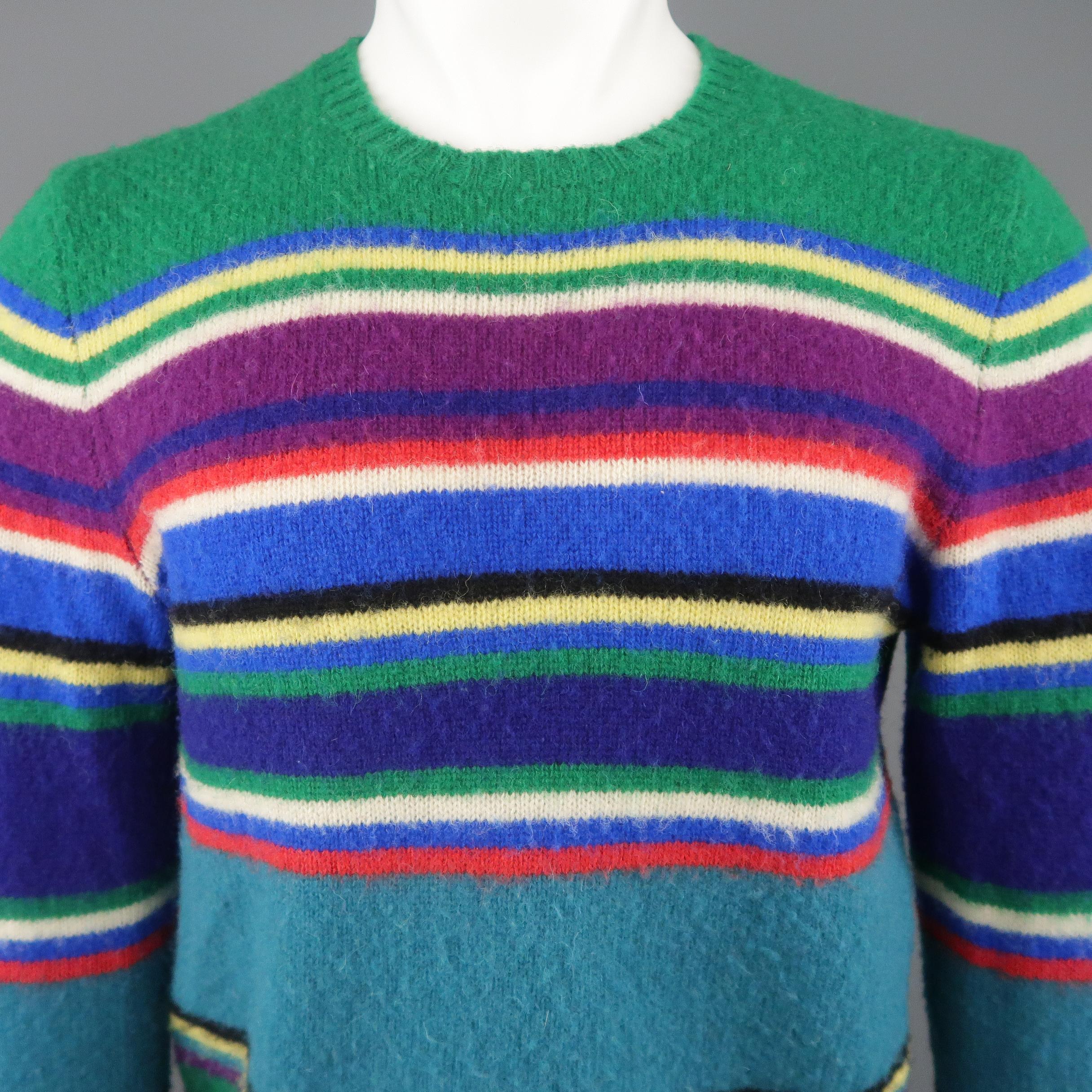 POLO RALPH LAUREN pullover sweater comes in teal and green wool knit with all over multi-color stripe pattern and ribbed crewneck and cuffs.
 
Very Good Pre-Owned Condition.
Marked: M
 
Measurements:
 
Shoulder: 17 in.
Chest: 42 in.
Sleeve: 29