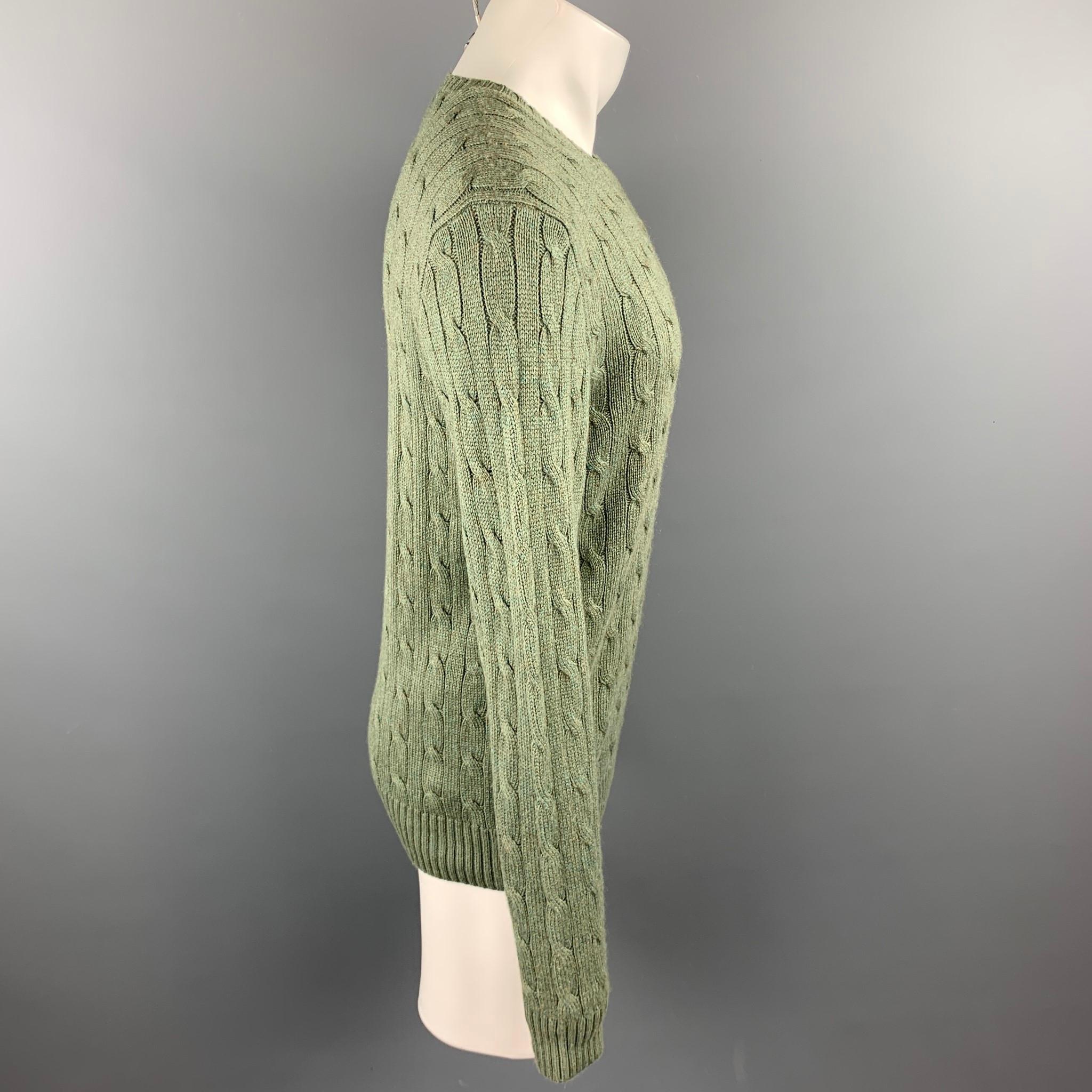 RALPH LAUREN sweater comes in a moss green with a embroidered detail cable knit silk / cashmere featuring a crew-neck.

Excellent Pre-Owned Condition.
Marked: M

Measurements:

Shoulder: 18 in.
Chest: 40 in.
Sleeve: 26.5 in.
Length: 25 in.