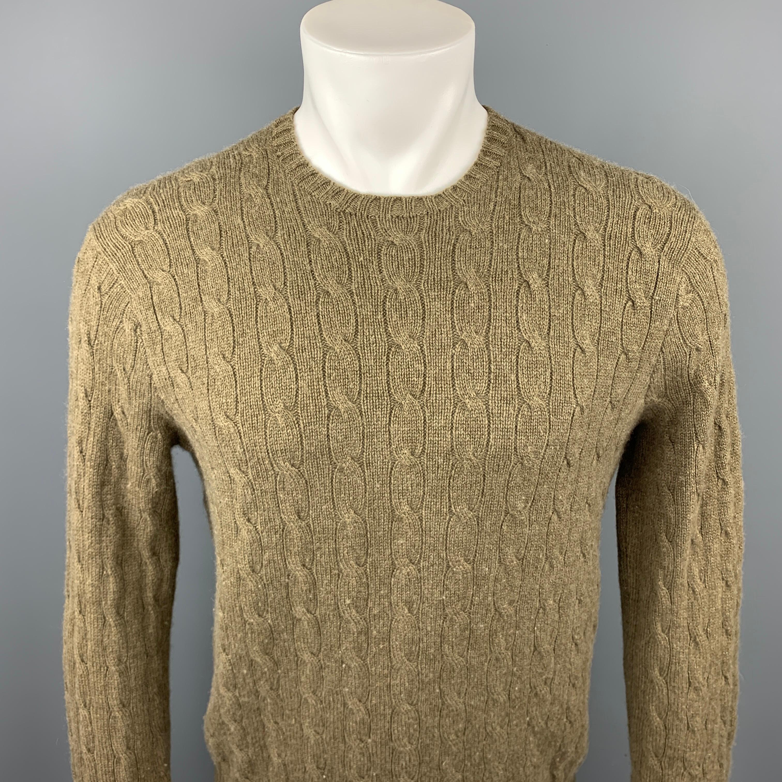 RALPH LAUREN sweater comes in a olive cable knit cashmere featuring a crew-neck.

Very Good Pre-Owned Condition.
Marked: M

Measurements:

Shoulder: 19 in. 
Chest: 40 in. 
Sleeve: 31 in. 
Length: 25 in. 