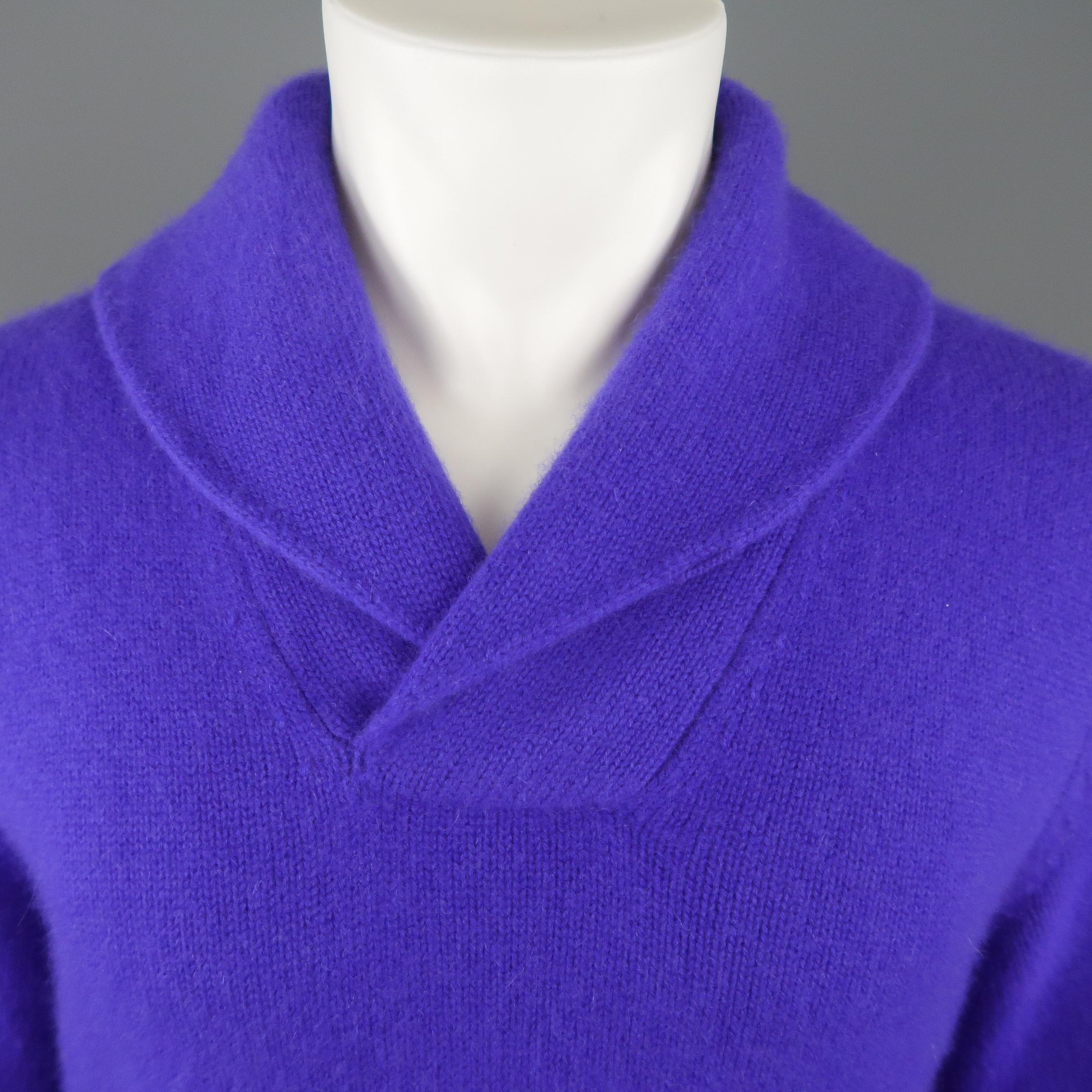 POLO RALPH LAUREN  pullover sweater comes in purple cashmere  knit with a wrapped shawl collar and ribbed cuffs.
 
Excellent Pre-Owned Condition.
Marked: M
 
Measurements:
 
Shoulder: 19 in.
Chest: 42 in.
Sleeve: 25 in.
Length: 26 in.