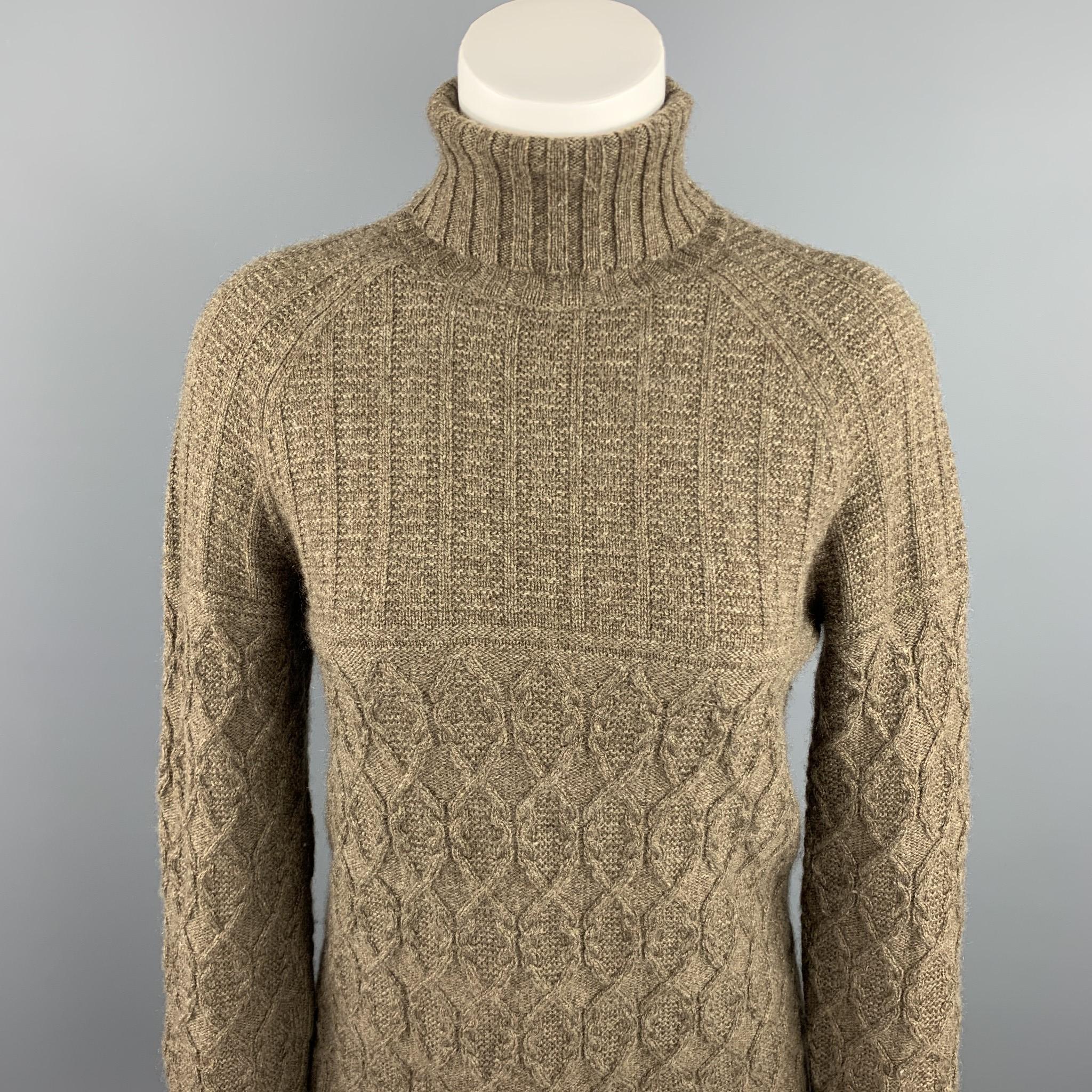 RALPH LAUREN COLLECTION pullover comes in a taupe knitted cashmere featuring a turtleneck style. Made in Italy.

Excellent Pre-Owned Condition.
Marked: S

Measurements:

Shoulder: 16 in. 
Bust: 34 in. 
Sleeve: 26 in. 
Length: 23 in.
