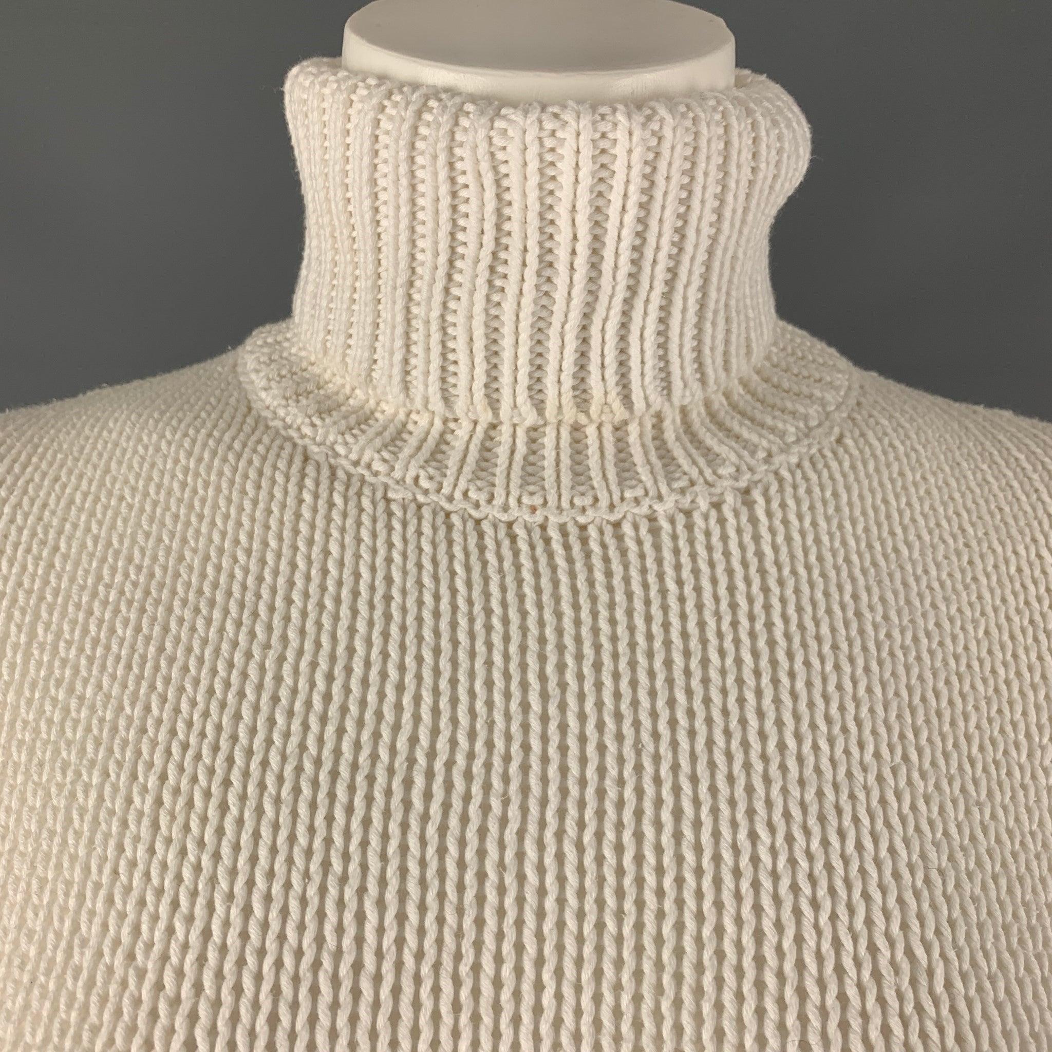 RALPH LAUREN COLLECTION pullover comes in a white cotton knit material featuring a turtleneck. Made in Italy. Very Good Pre-Owned Condition. 

Marked:   M 

Measurements: 
 
Shoulder: 15 inches Chest: 34 inches Sleeve: 29 inches Length: 20 inches  
