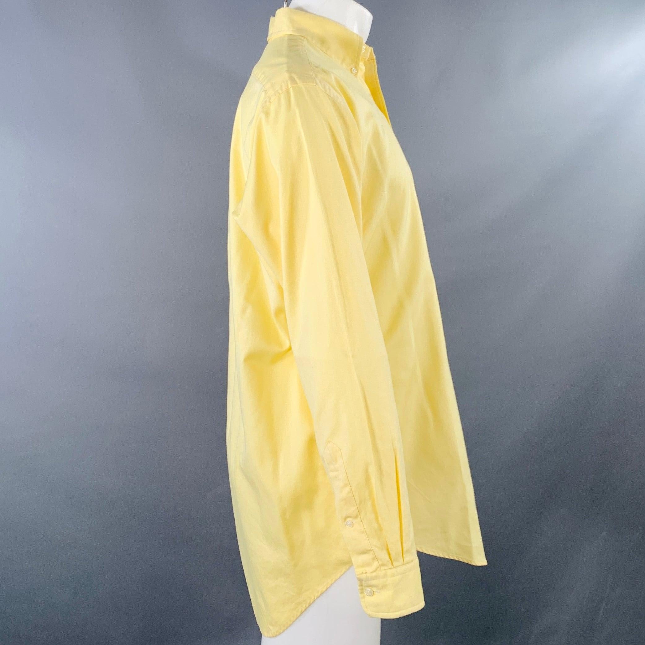 RALPH LAUREN long sleeve shirt in a yellow cotton woven fabric featuring a button down collar, embroidered logo, and button closure. Excellent Pre-Owned Condition. 

Marked:   15.5/M 

Measurements: 
 
Shoulder: 18.5 inches Chest: 47 inches Sleeve: