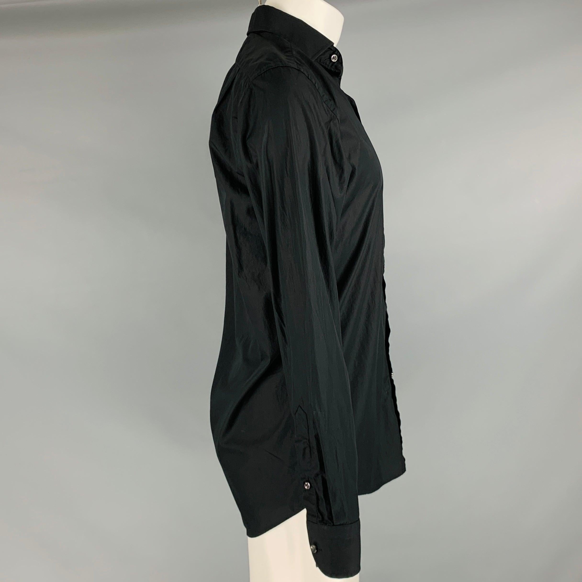 RALPH LAUREN BLACK LABEL long sleeve shirt
in a black cotton fabric featuring cutaway collar and button closure. Made in Italy.Excellent Pre-Owned Condition. 

Marked:   15 

Measurements: 
 
Shoulder: 16.5 inches Chest: 41 inches Sleeve: 25 inches