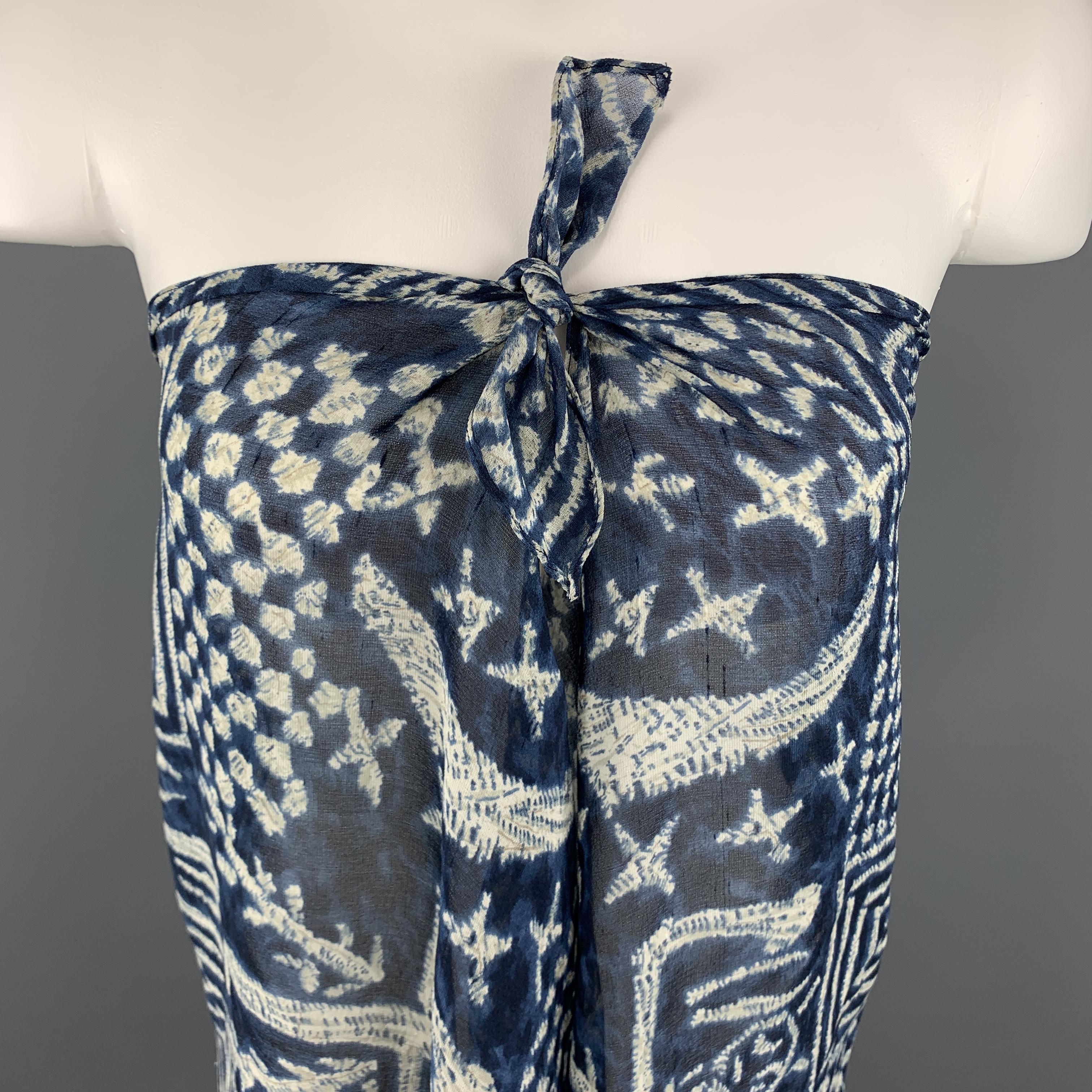 COLLECTION by RALPH LAUREN Strapless Blouse comes in a blue tone in a see through silk material, with an abstract print, a front tie and asymmetrical hem. Made in USA.
 
Excellent Pre-Owned Condition.
Marked: S
 
Measurements:
 
Chest: 33