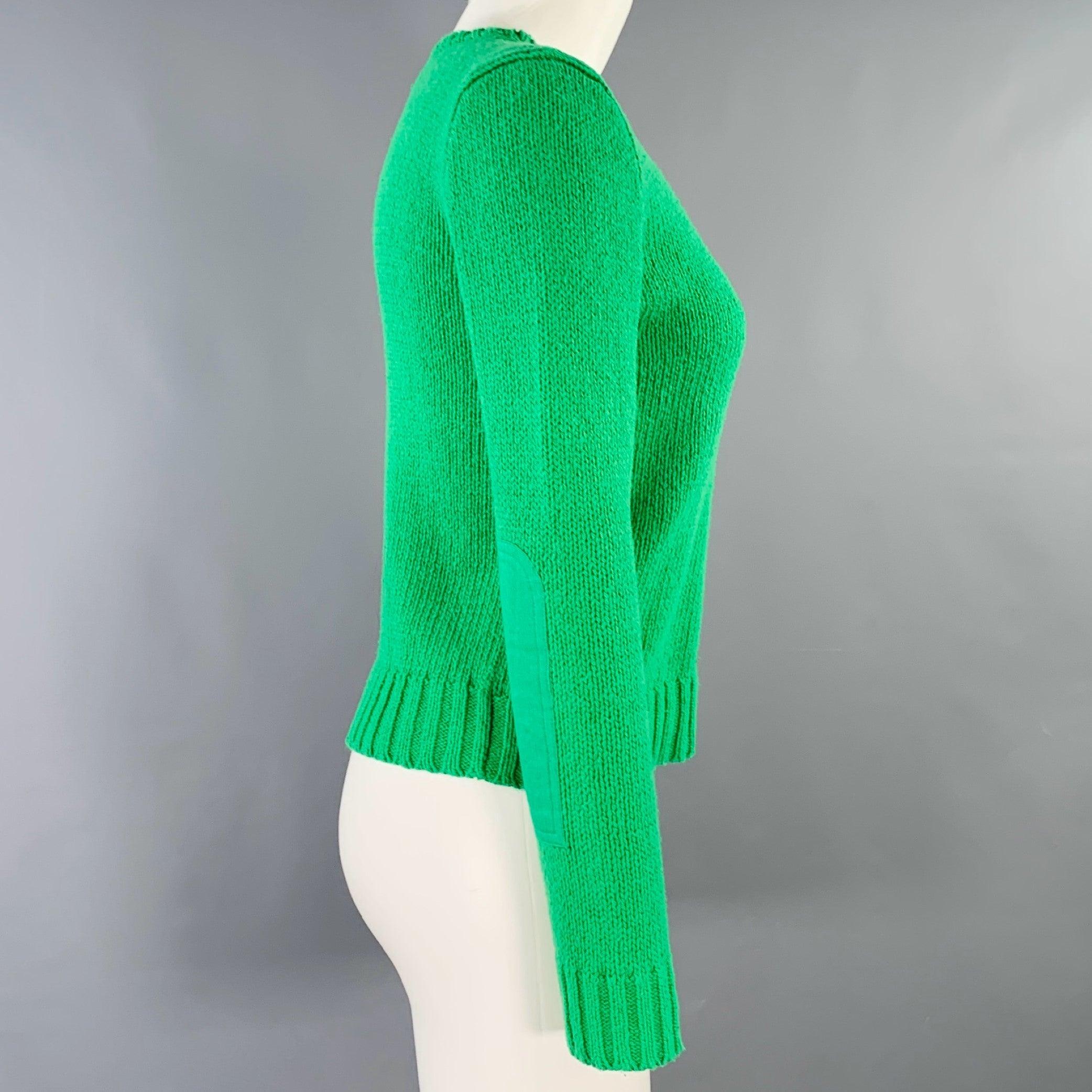 RALPH by RALPH LAUREN sweater
in a
green cotton knit featuring pink embroidered logo, long sleeves, and V-neck. Excellent Pre-Owned Condition. 

Marked:   S 

Measurements: 
 
Shoulder: 15.5 inches Bust: 35 inches Sleeve: 24 inches Length: 19 inches