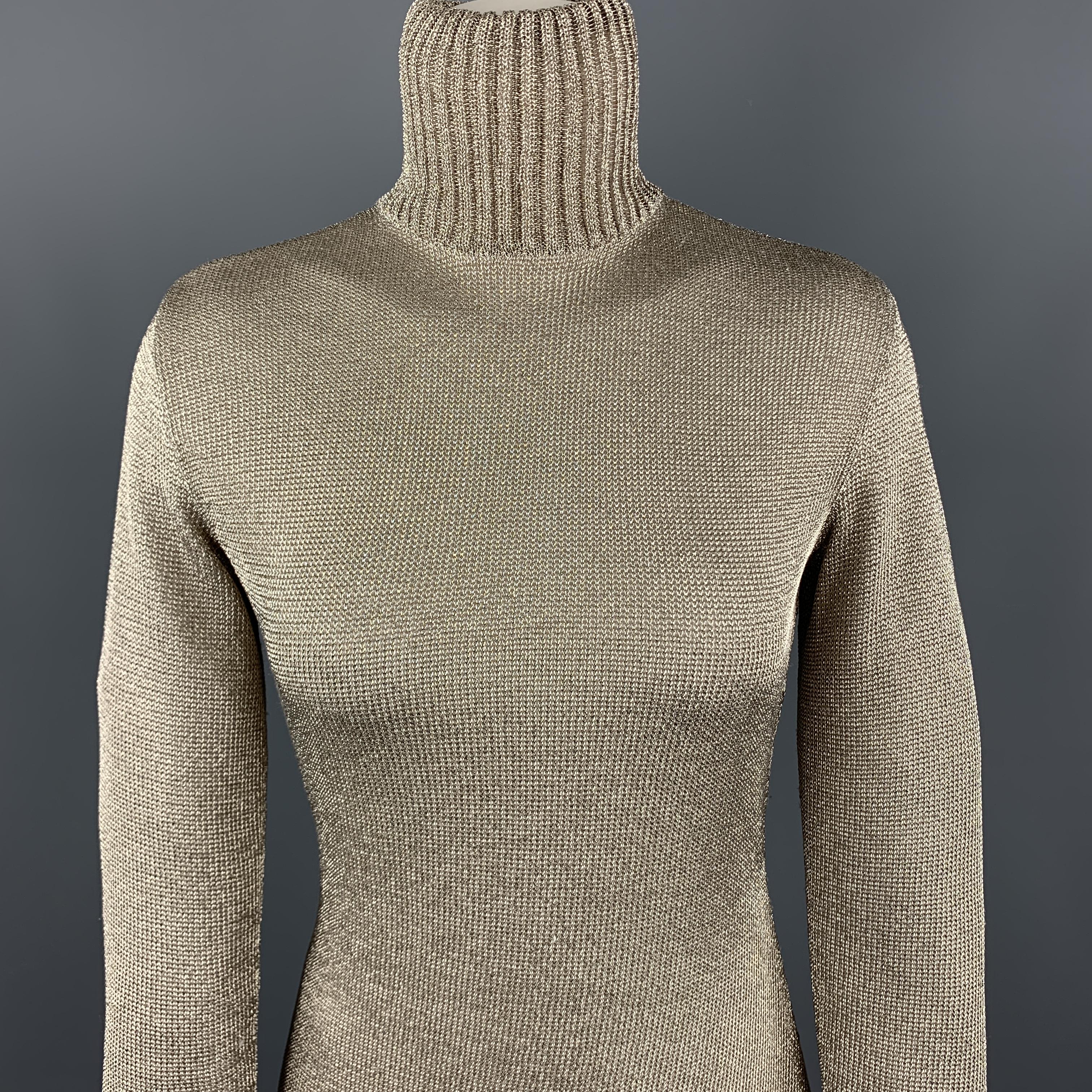 RALPH LAUREN BLUE LABEL dress comes in viscose blend knit with a metallic gold exterior, high ribbed knit collar, and hidden back zip. 

Excellent Pre-Owned Condition.
Marked: S

Measurements:

Shoulder: 14 in.
Bust: 34 in.
Waist: 287 in.
Hip: 34