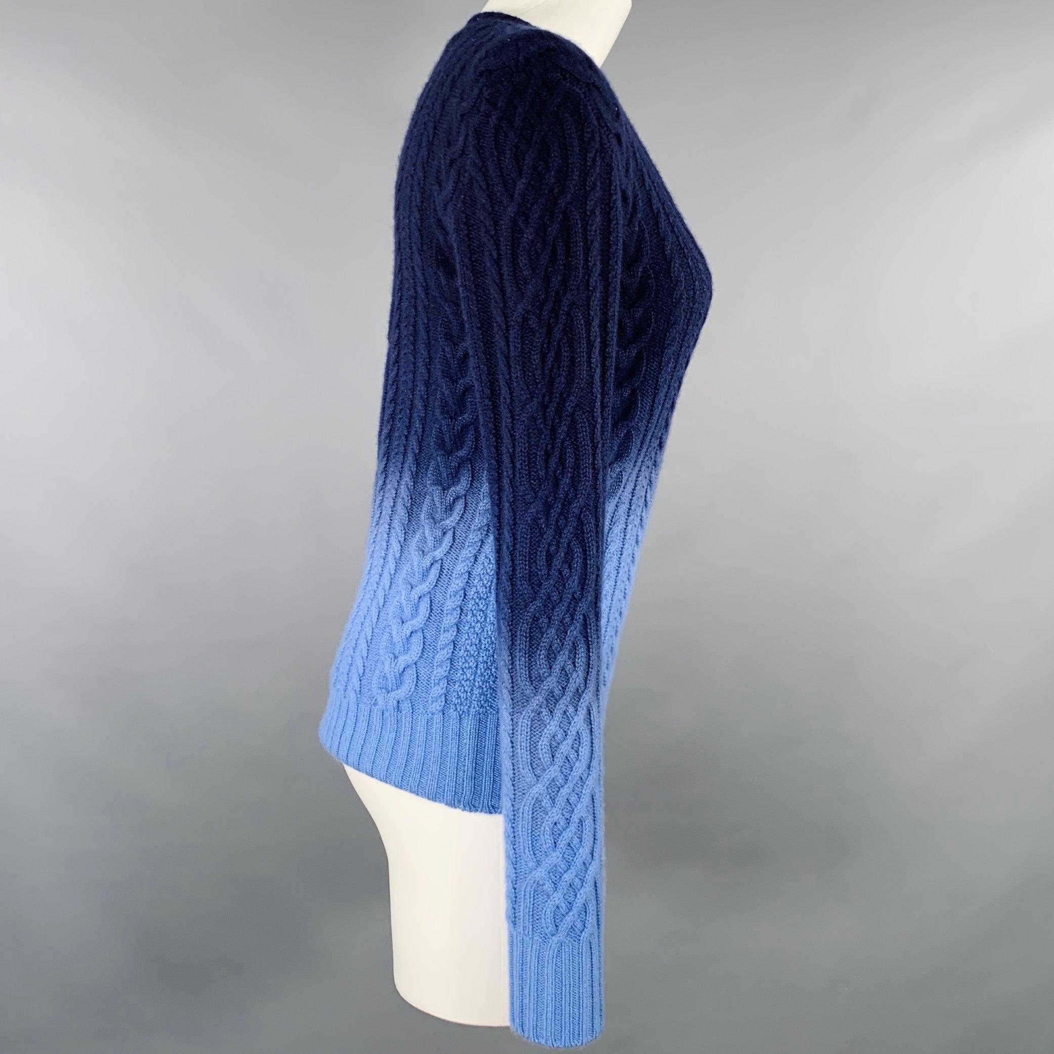 RALPH LAUREN COLLECTION pullover
in a navy and blue cashmere knit featuring an ombre design, cable knit style, and crew neck. Made in Italy.Excellent Pre-Owned Condition. 

Marked:   S 

Measurements: 
 
Shoulder: 17.5 inches Bust: 34 inches Sleeve: