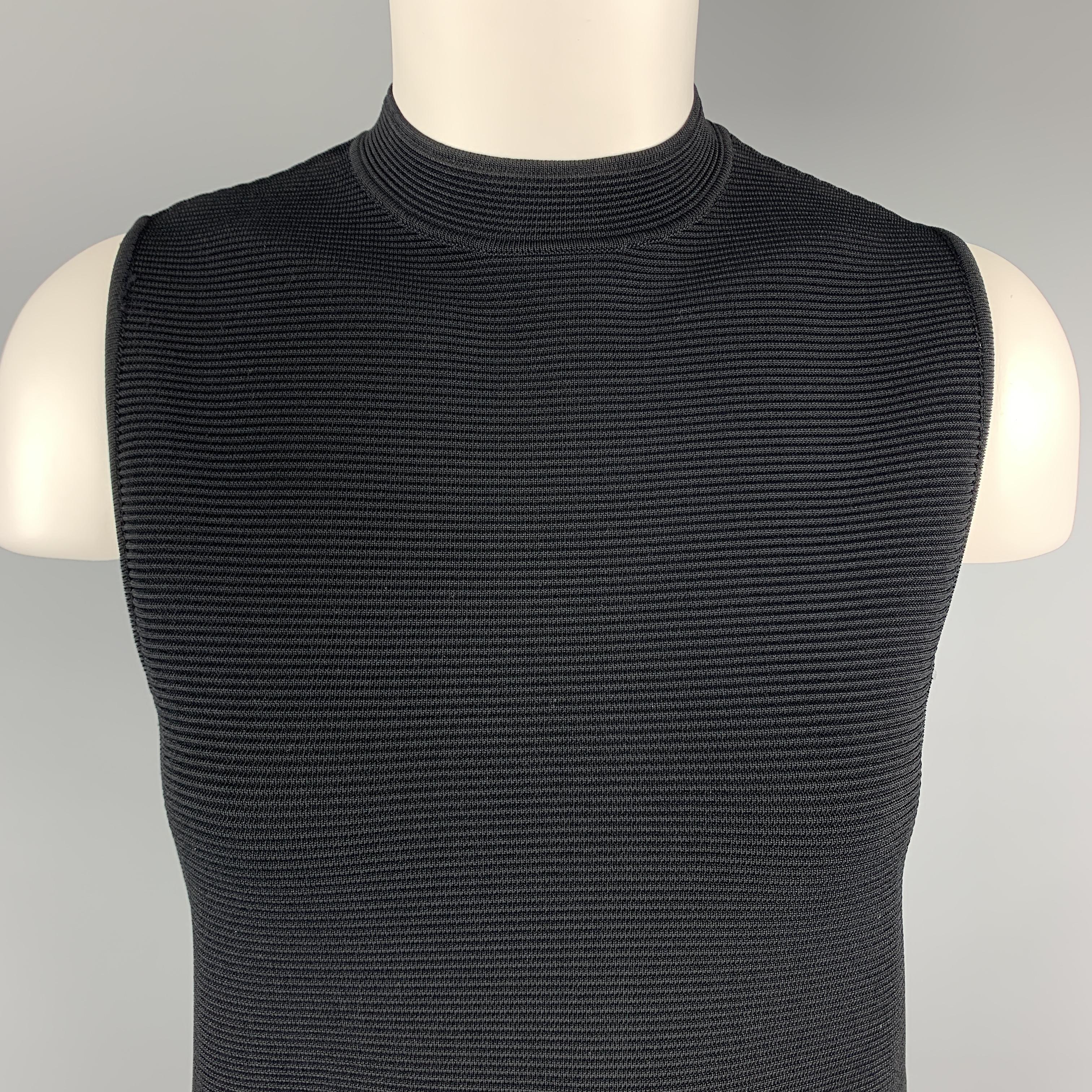 RALPH LAUREN COLLECTION shift dress comes in a structured ribbed textured viscose blend knit with an A line silhouette. Made in Italy.

Excellent Pre-Owned Condition.
Marked: S

Measurements:

Shoulder: 12.5 in.
Bust: 34 in.
Waist: 35 in.
Hip: 38