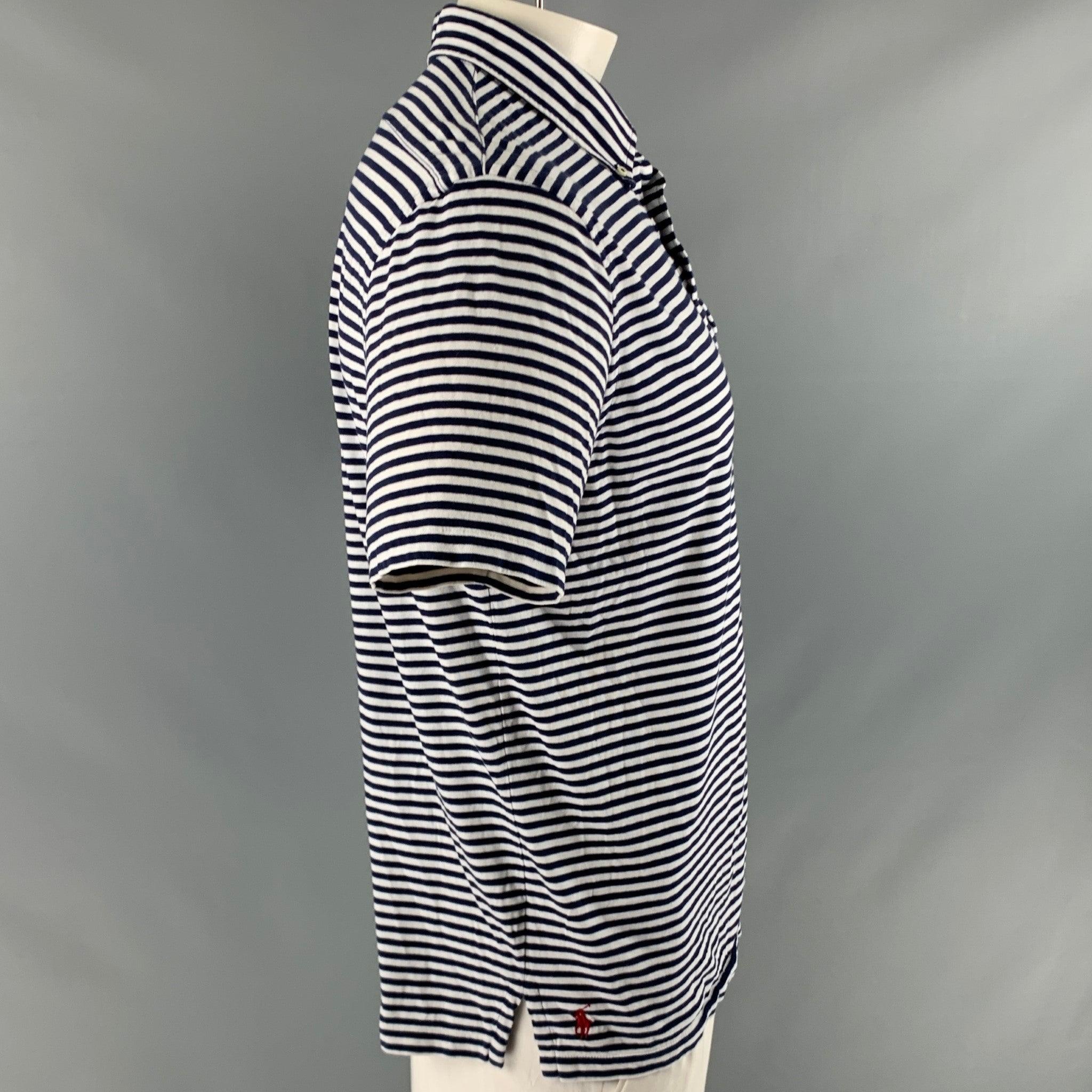 RALPH LAUREN polo
in a
navy and white cotton featuring horizontal stripe pattern, one pocket, button down collar, and half placket button closure.Very Good Pre-Owned Condition. Minor pilling. 

Marked:   XL 

Measurements: 
 
Shoulder: 18.5 inches