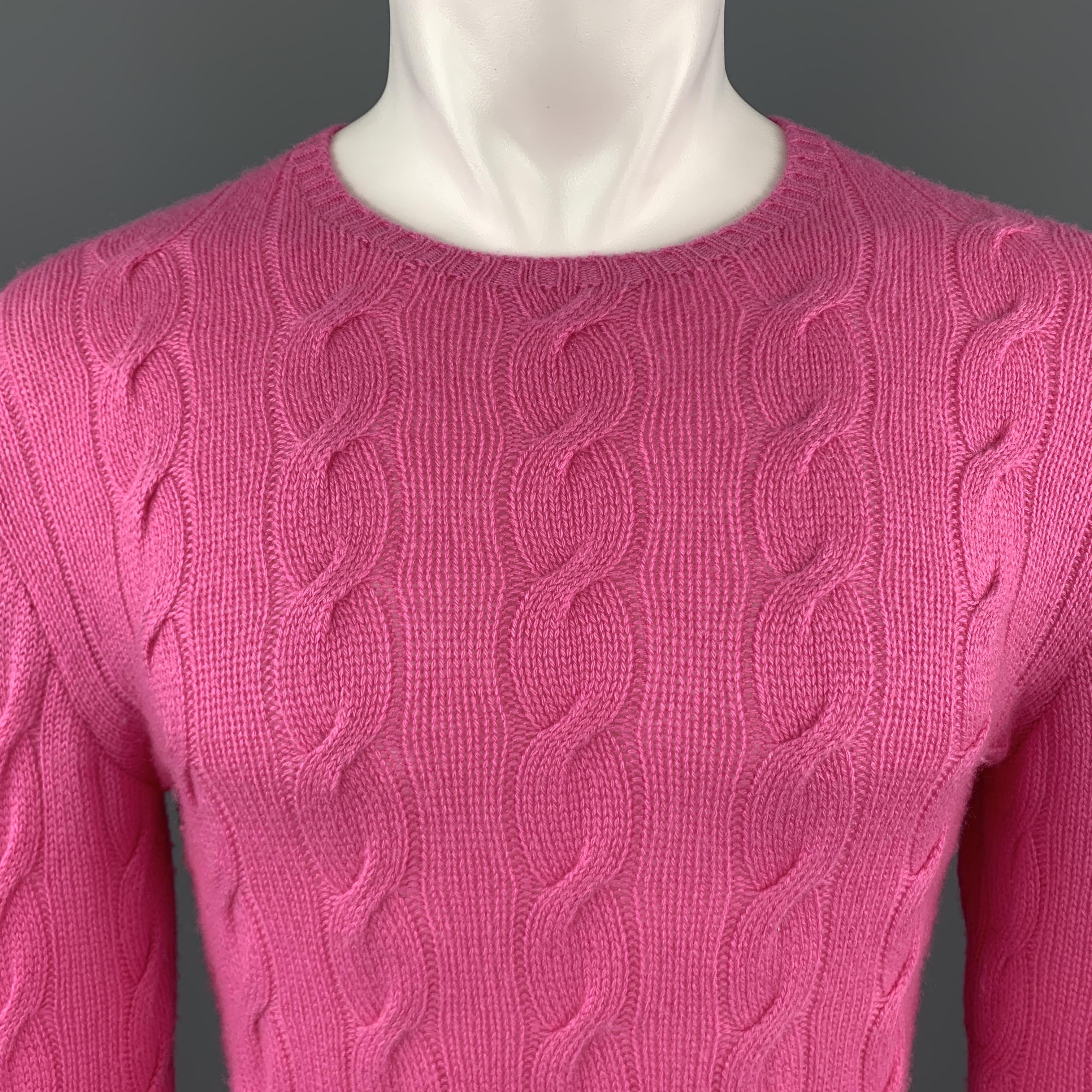 RALPH LAUREN PURPLE LABEL pullover sweater comes in pink cashmere cable knit with a crewneck. Made in Italy.

Excellent Pre-Owned Condition.
Marked: XS

Measurements:

Shoulder: 17 in.
Chest: 34 in.
Sleeve: 27 in.
Length: 27 in.