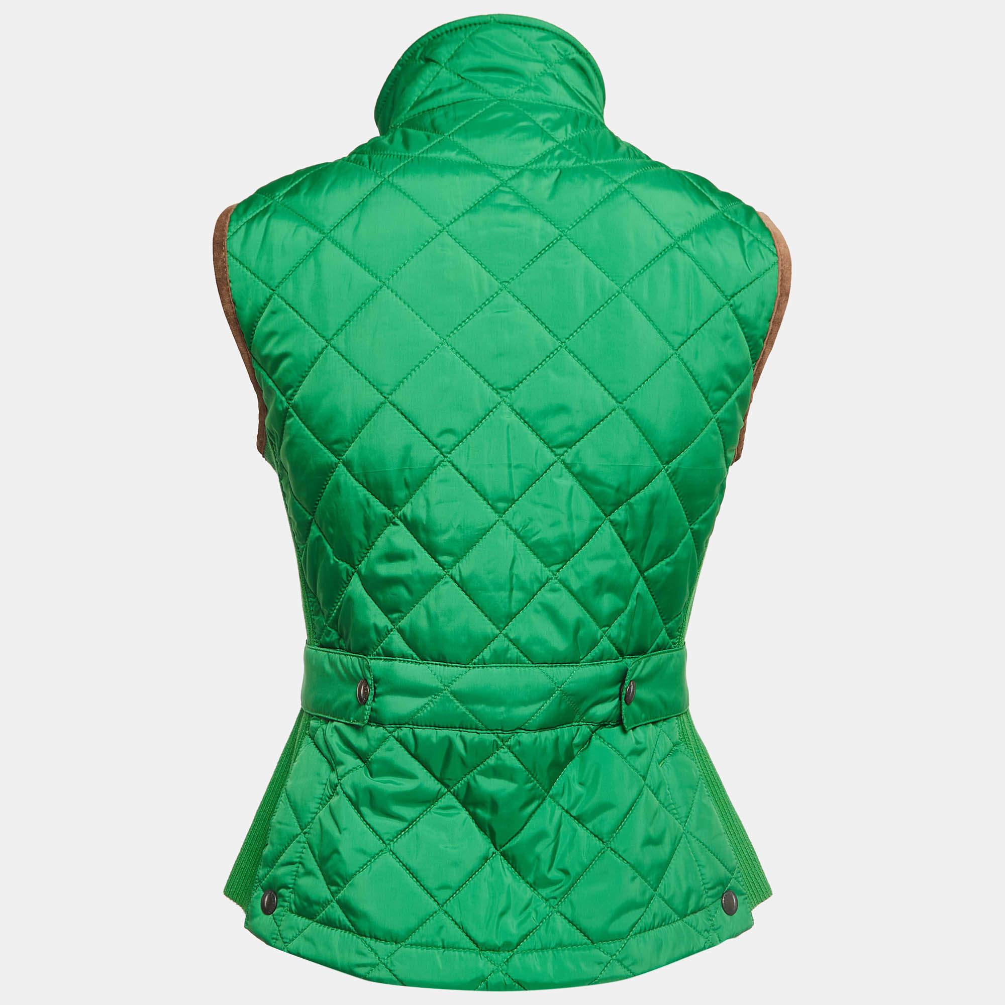 Immerse yourself in the vibrant charm of the Ralph Lauren Sport vest. Crafted with meticulous attention, this vest boasts a green hue, adorned with exquisite embroidery and sleek suede trim, offering both style and functionality for your outdoor