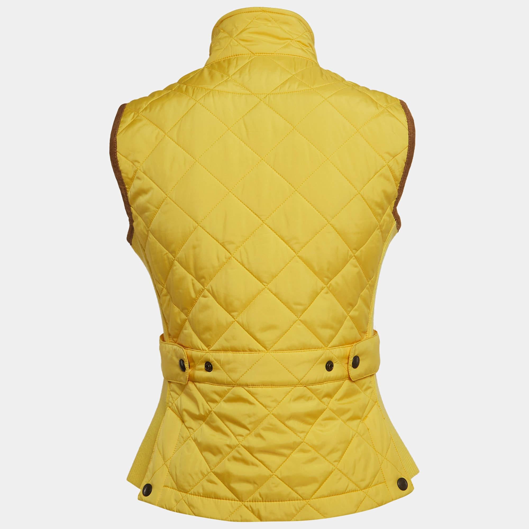 Immerse yourself in the vibrant charm of the Ralph Lauren Sport vest. Crafted with meticulous attention, this vest boasts a sunny yellow hue, adorned with exquisite embroidery and sleek suede trim, offering both style and functionality for your