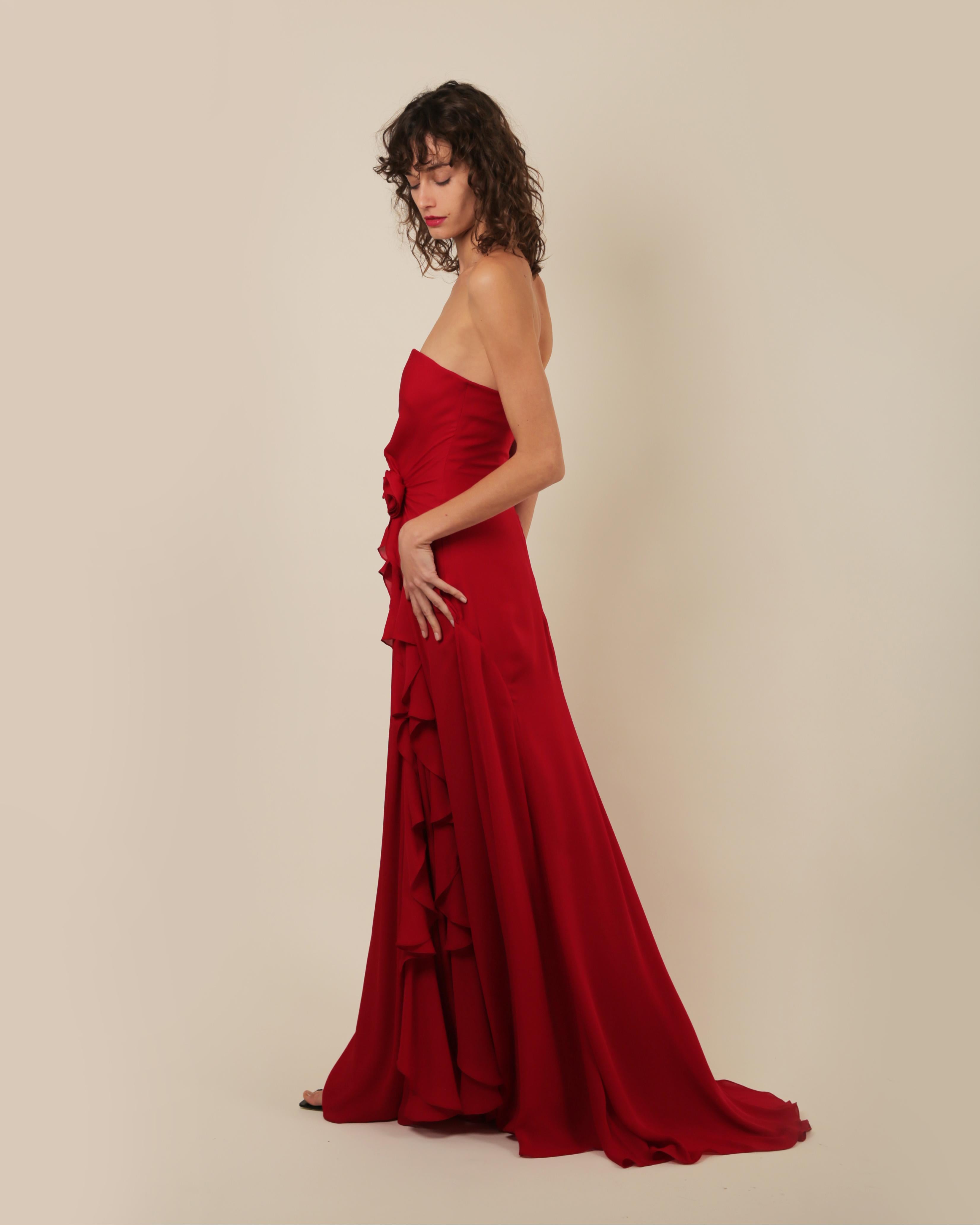 LOVE LALI Vintage

From Ralph Lauren purple label S/S 2013 runway collection that was inspired by Spain/Latin American 
A gorgeous sweeping ruby red evening gown with a strapless sweetheart neckline in silk georgette 
The bodice of the dress is