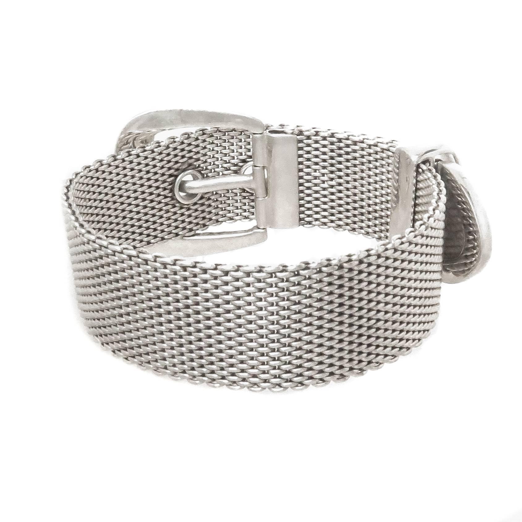 Circa 1990s Ralph Lauren Sterling Silver Mesh link Buckle Bracelet, measuring 9 3/4 inches in length and 3/4 inch wide. Very finely made and having a very soft and flexible mesh. 