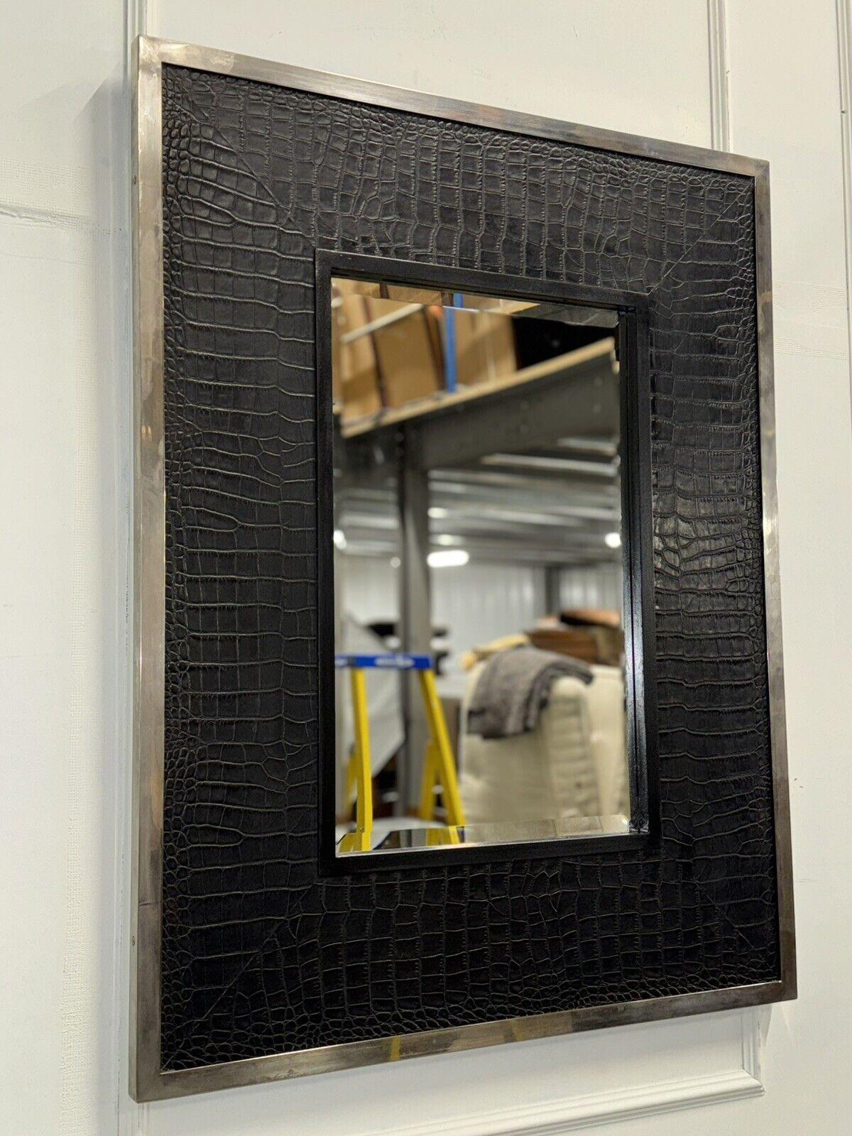 
We are delighted to offer for sale This Ralph Lauren-style Decorative Luxury Designer Wall Mirror.

 Embodies sophistication and classic elegance, encapsulating the brand's signature aesthetic. The frame is meticulously crafted from high-quality