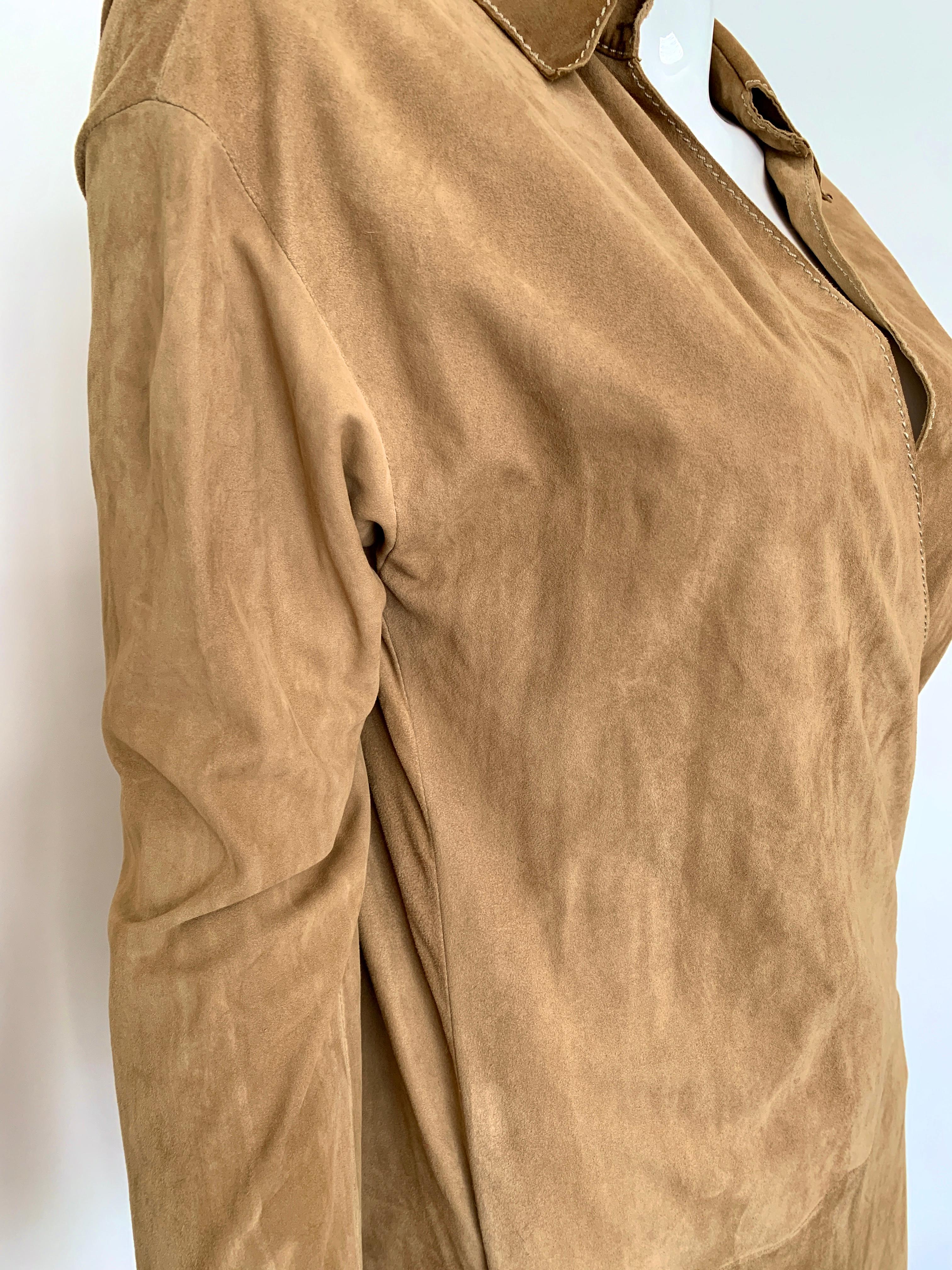Classic - this Ralph Lauren wrap dress is timeless. 

Tan in coloring - reference to different photos for lighting in the exposed sun to indoor. The wrap is low on the hip and the skirt hits below the knee. 
Freshly drycleaned, but a small stain on