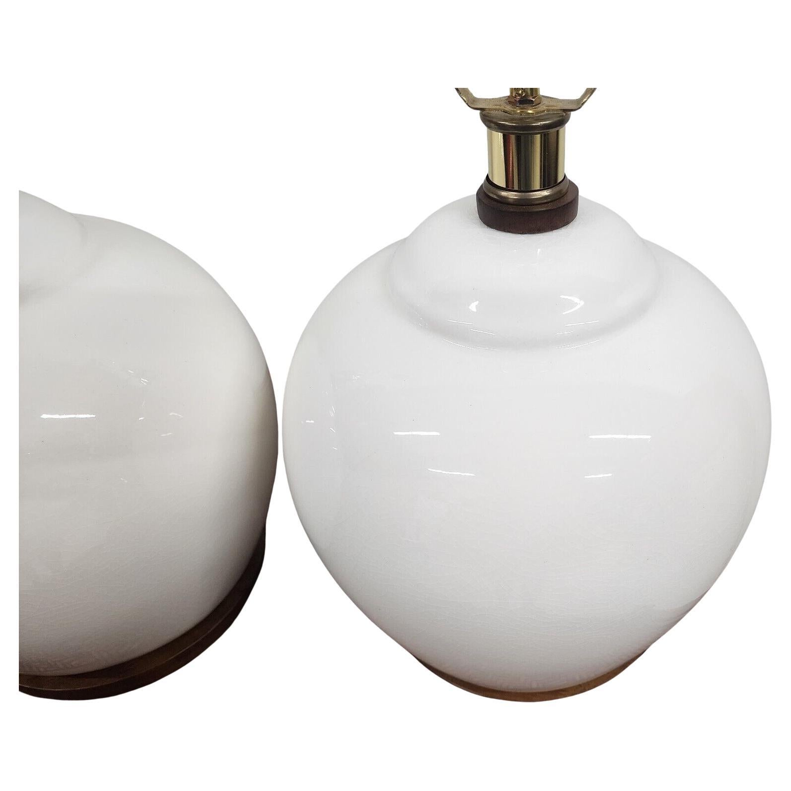 For FULL item description click on CONTINUE READING at the bottom of this page.

Offering One Of Our Recent Palm Beach Estate Fine Lighting Acquisitions Of A
Pair of Ralph Lauren Ceramic Table Lamps in Eggshell White with Crackle Finish
On a Wood
