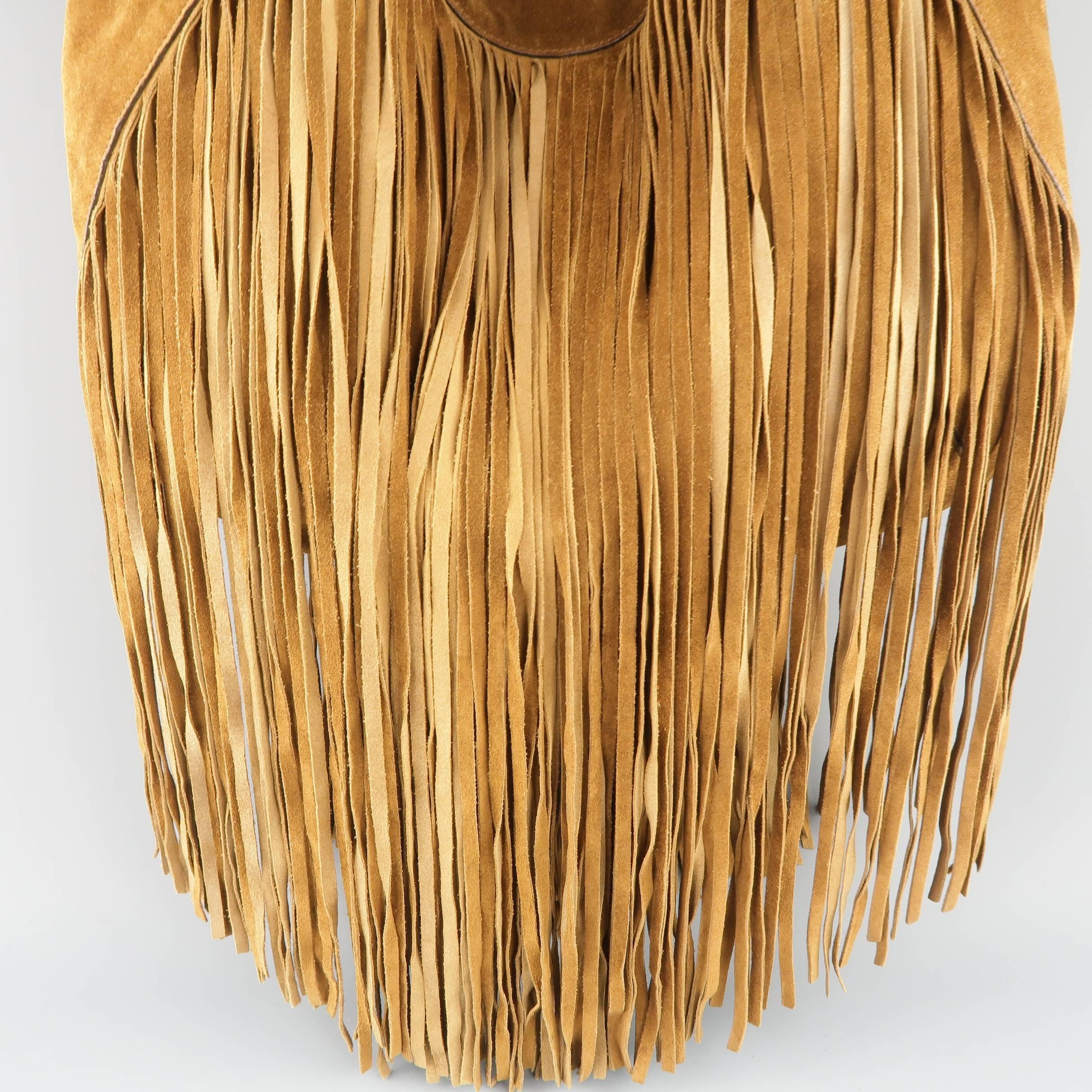 RALPH LAUREN hobo shoulder bag comes in tan brown suede and features double adjustable top handles with gold tone buckle hardware, embossed metal Proprietor tag, and long fringe trim. Marks shown in detail shots. As-is. Made in Italy.
 
Fair