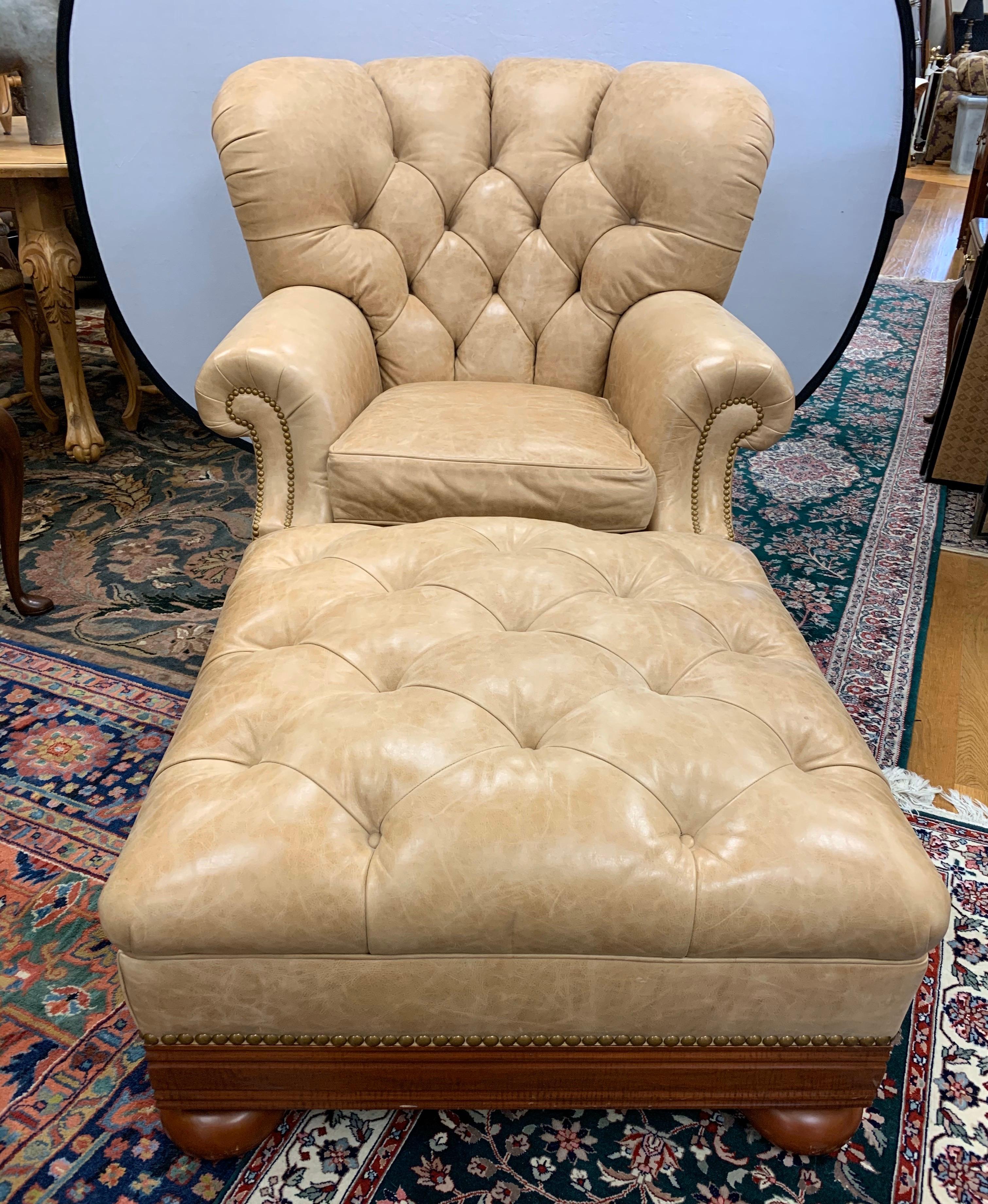 This Ralph Lauren labelled tufted club chair and matching ottoman has gorgeous Brunschwig & Fils leather, very thick, yet soft and top of the line quality. This chair is the large scale wingback and its Silhouette is often copied but there is a