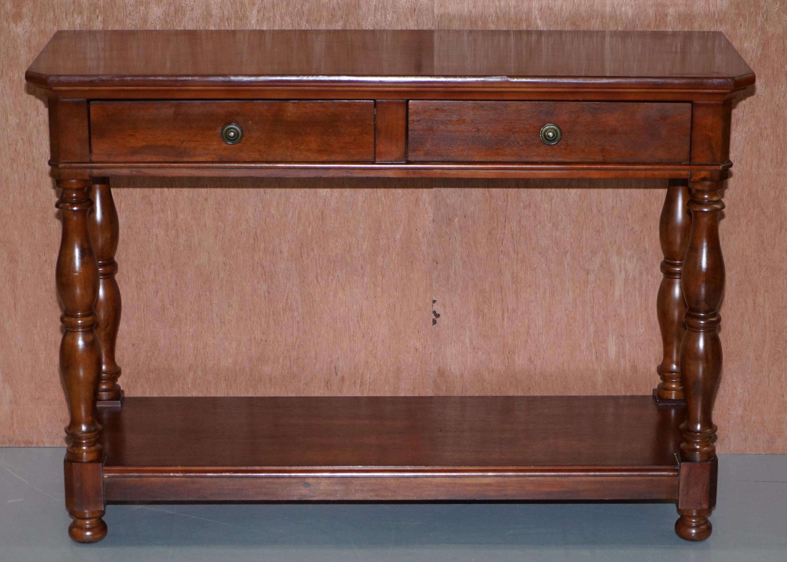 We are delighted to offer for sale this lovely Ralph Lauren light American mahogany twin drawer sideboard

A very well made, decorative and versatile piece of furniture, Ralph Lauren make very high quality pieces out of choice cuts of premium