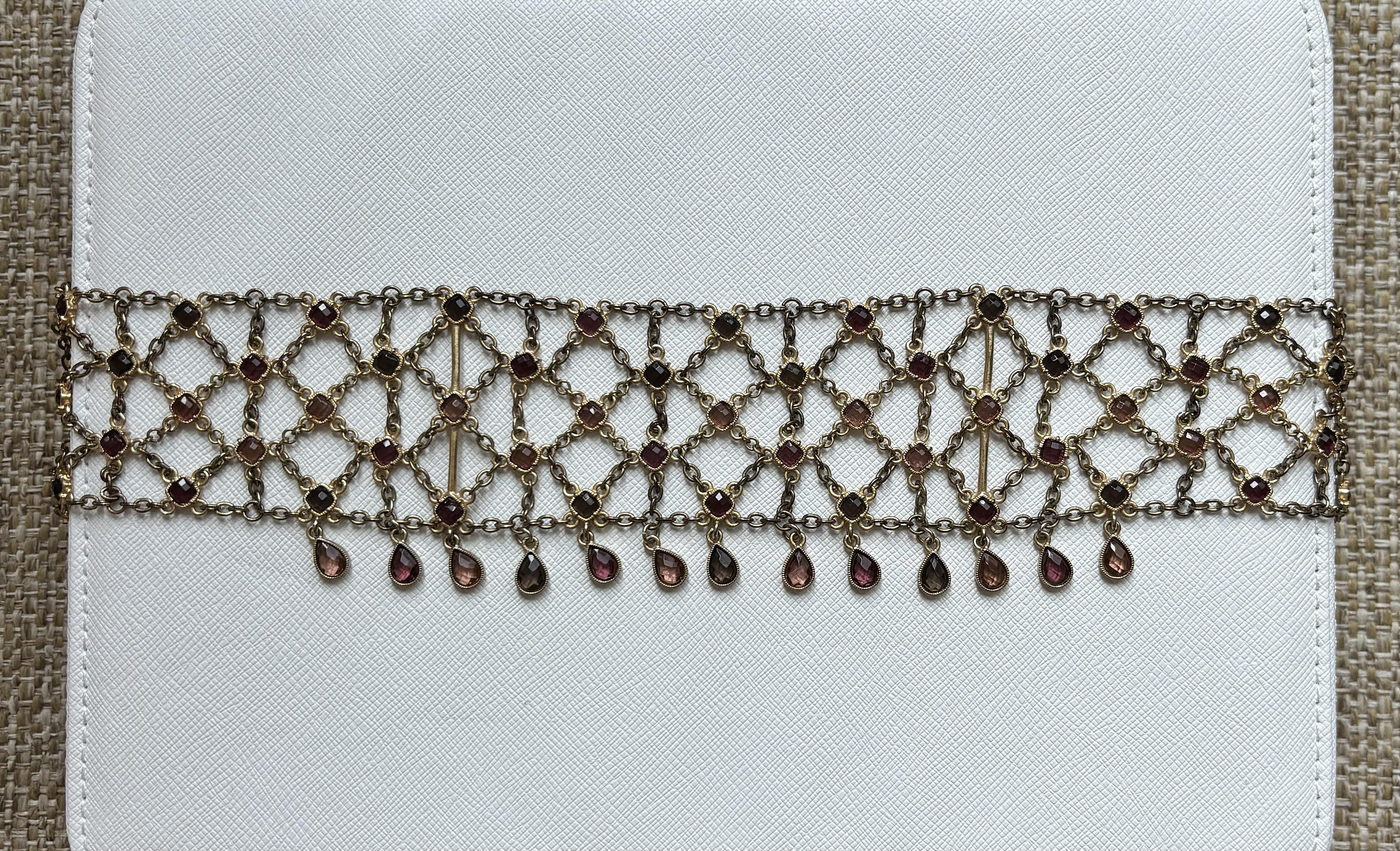 Ralph Lauren
Vintage
Choker necklace dripping in gemstones
Victorian Edwardian Style

Excellent condition, one flaw as pictured. Not missing any links, just needs to be reconnected. Doesn't affect look nor wear because it's in the back.

Longest