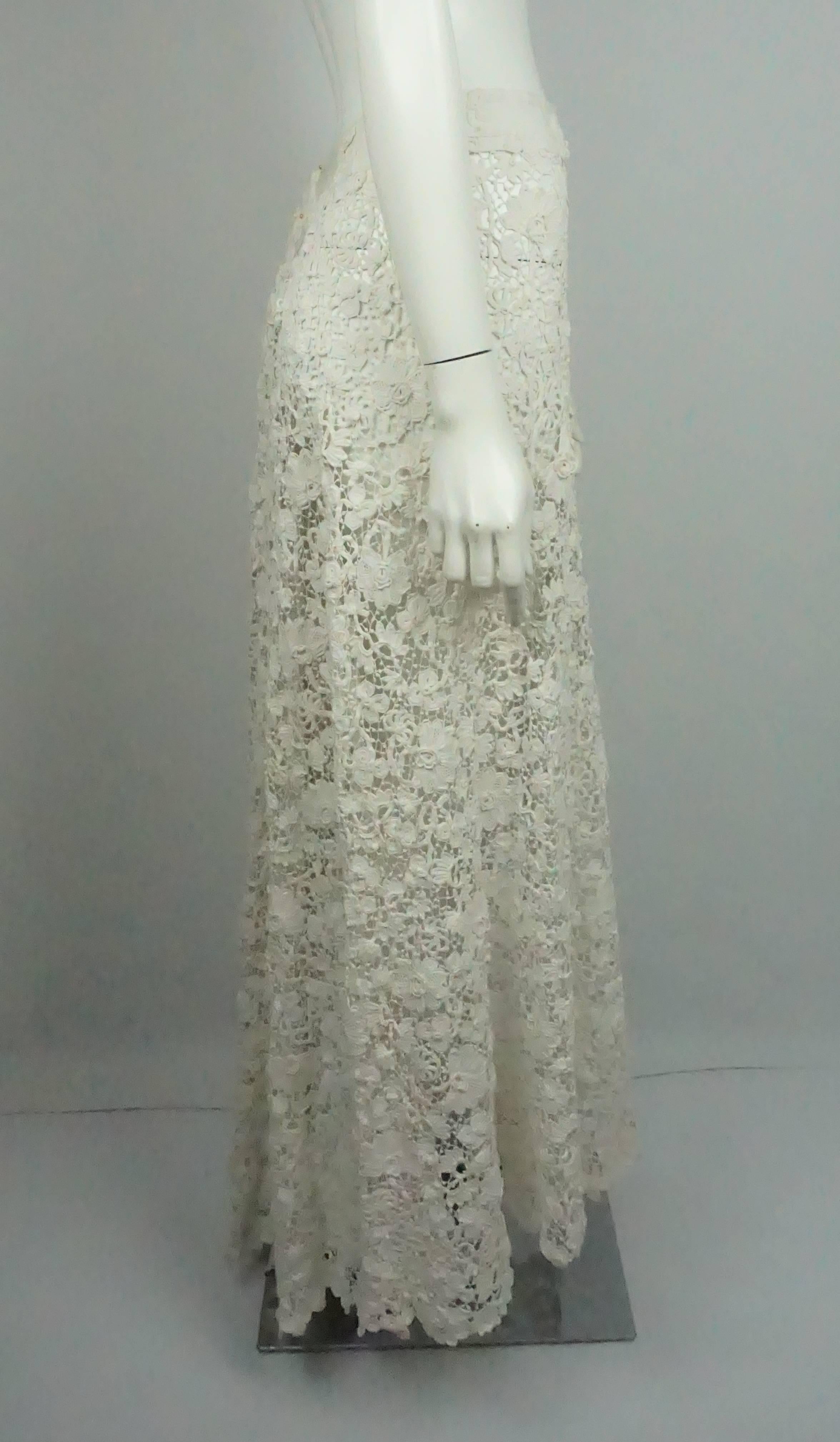 Ralph Lauren Vintage Ivory Irish Crochet 1900's Lace Skirt - NWT  This spectacular Ralph Lauren Vintage piece is one of a kind and made with Irish Crochet Lace from the 1900's. This very special skirt would be wonderful for a very special occasion.