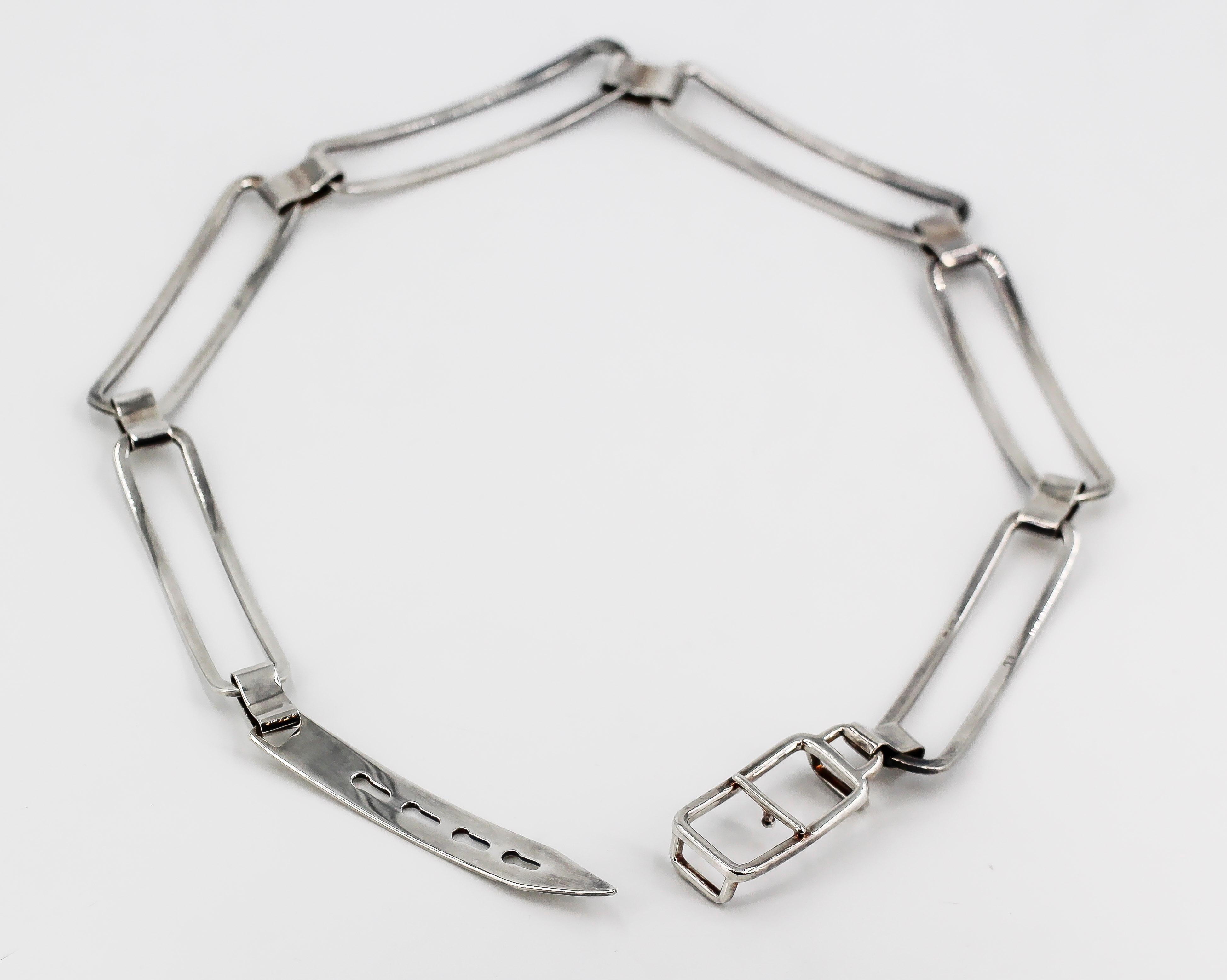 Highly fashionable sterling silver belt by Ralph Lauren, circa 1970s. It features an adjustable length. Total length 32.5