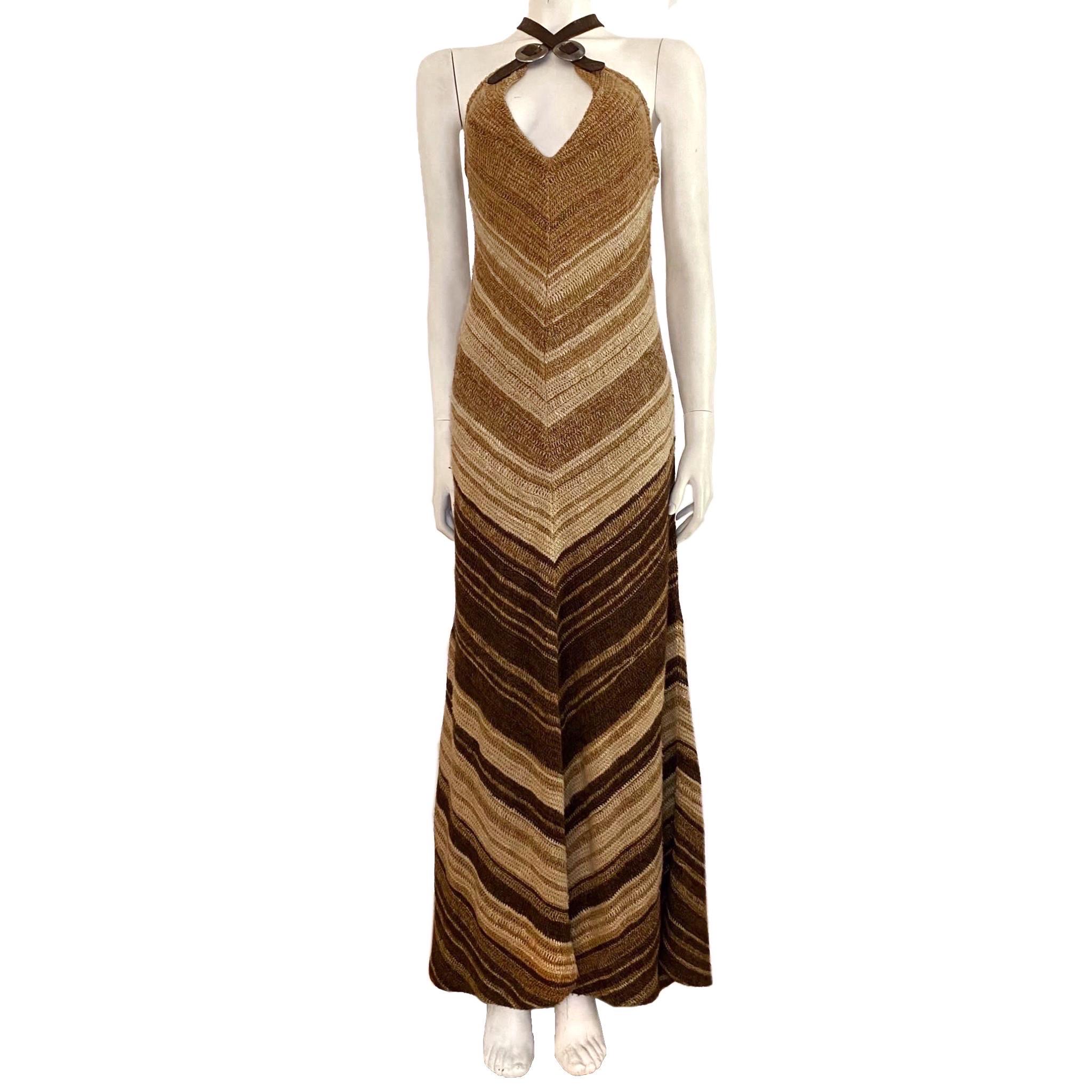 Ralph Lauren handknit zigzag brown maxi dress with carved leather buckled straps, which can be styled at will. Early 2010s.

Size label M

- front length: 146 cm/ 57,4 inch
- back length: 153 cm/ 60,2 inch
- pit to pit: 45 cm/ 17,7 inch
- waist: 78