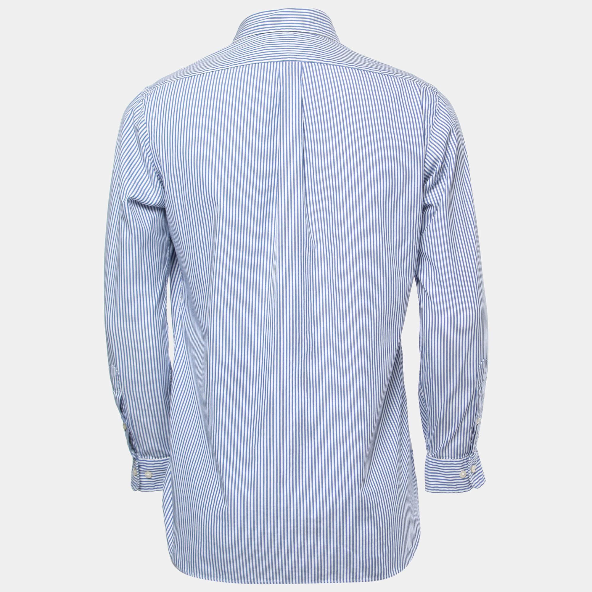 Questa camicia di Ralph Lauren è caratterizzata da strisce su tutta la superficie per un tocco di classe. Presenta un colletto semplice  chiusura frontale con bottoni  e maniche intere. Un paio di pantaloni casual e mocassini o scarpe da ginnastica