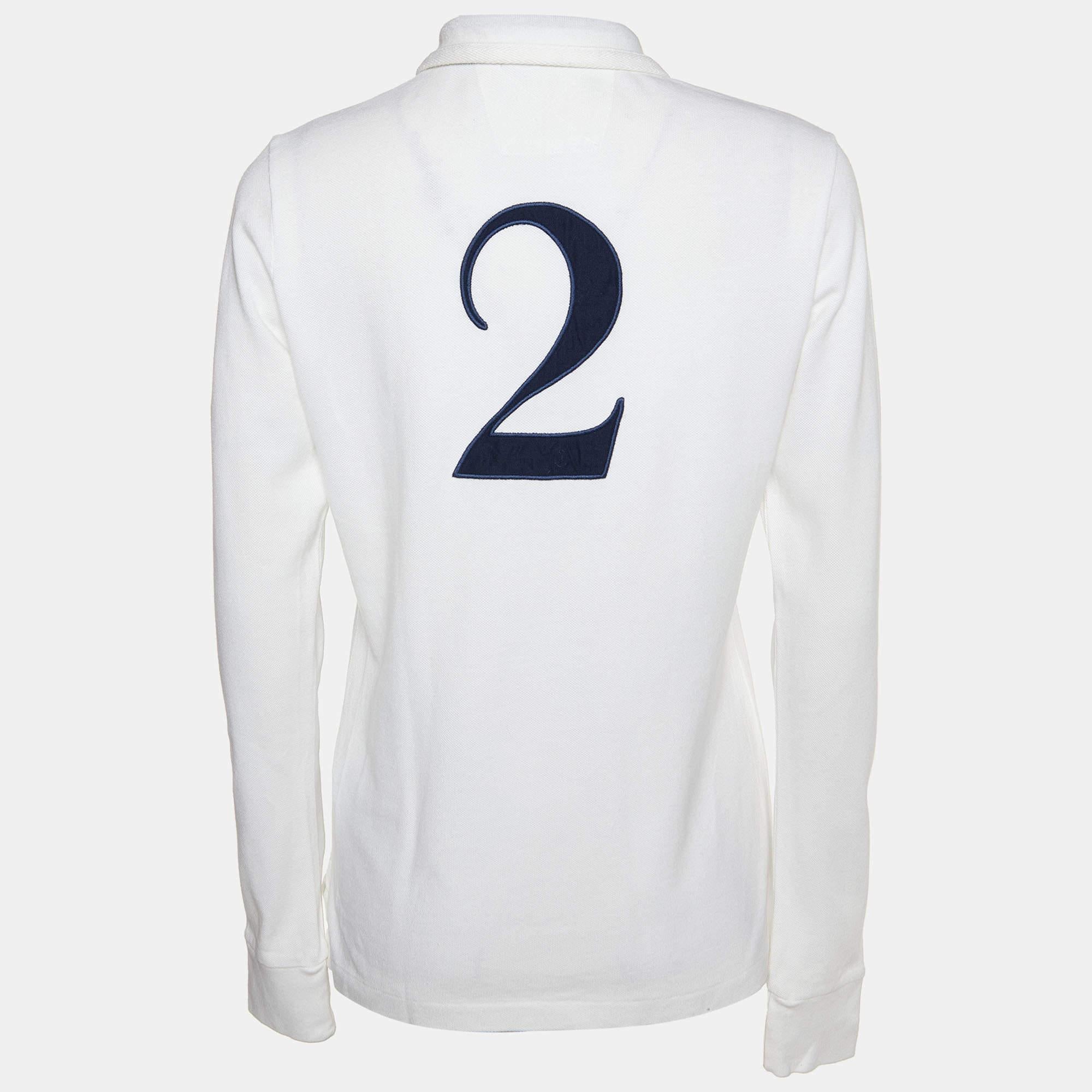 This Ralph Lauren Polo T shirt delivers on the requirements of style and comfort. It is made from cotton and designed with long sleeves buttons a simple collar and embroidered details.