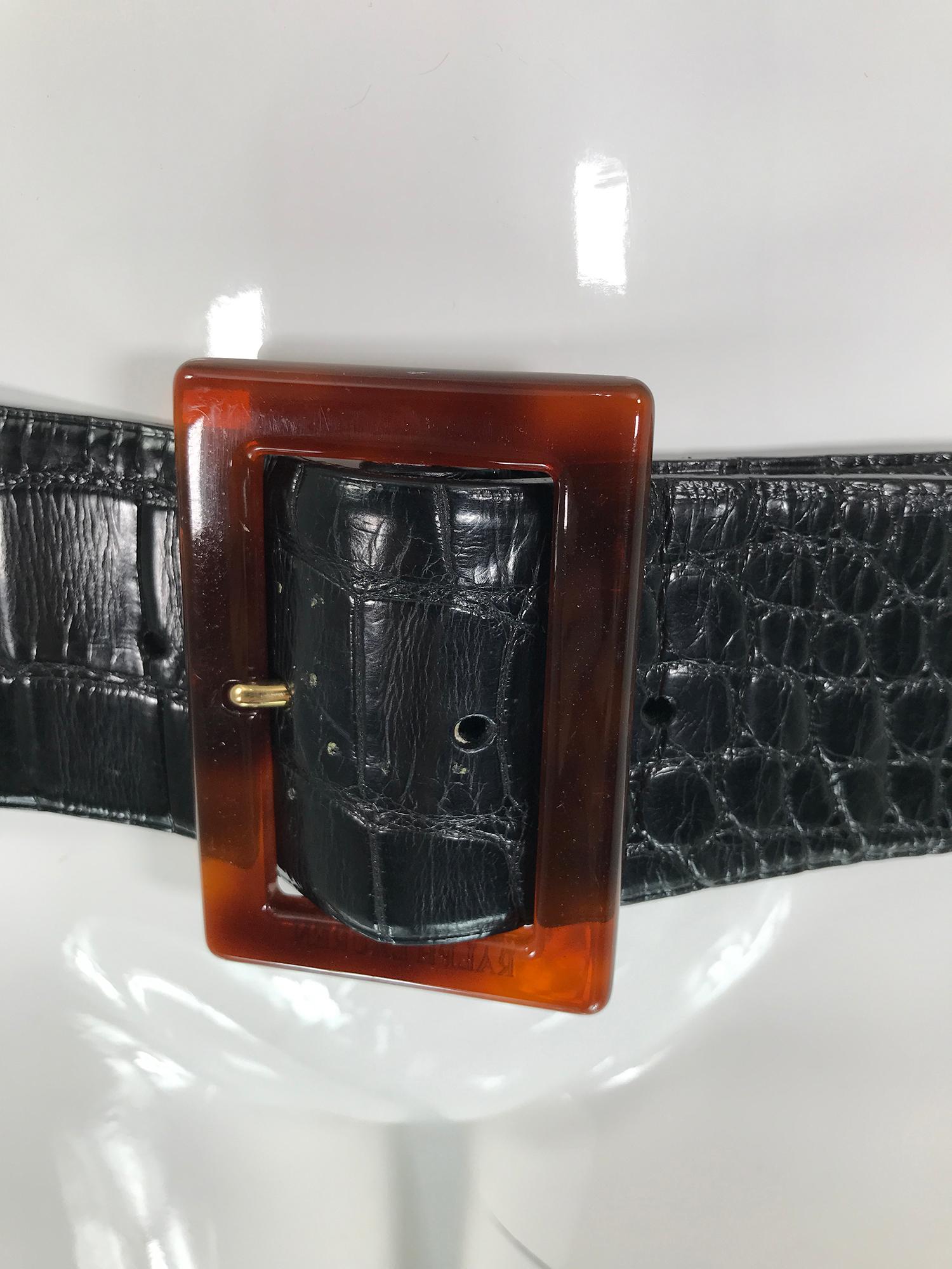 Ralph Lauren wide contour black alligator belt with amber Lucite buckle marked size Medium. Made in Italy, the buckle is marked Ralph Lauren.
In excellent condition.
2 1/4 