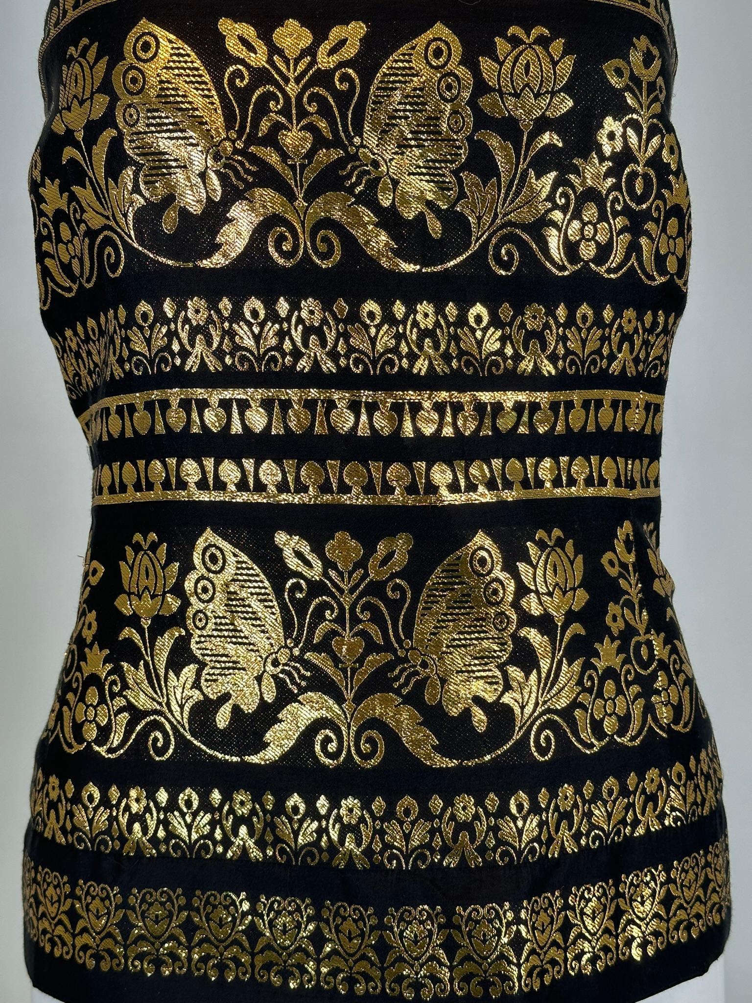 Ralph Lauren Woven Black & Gold Silk Blend Woven Design Strapless Peplum Top 12. 
Butterflies & flowers woven in gold on black silk blend strapless top. Princess seam front & back. Boned top closes at the side with a zipper & hook & eye at the top.